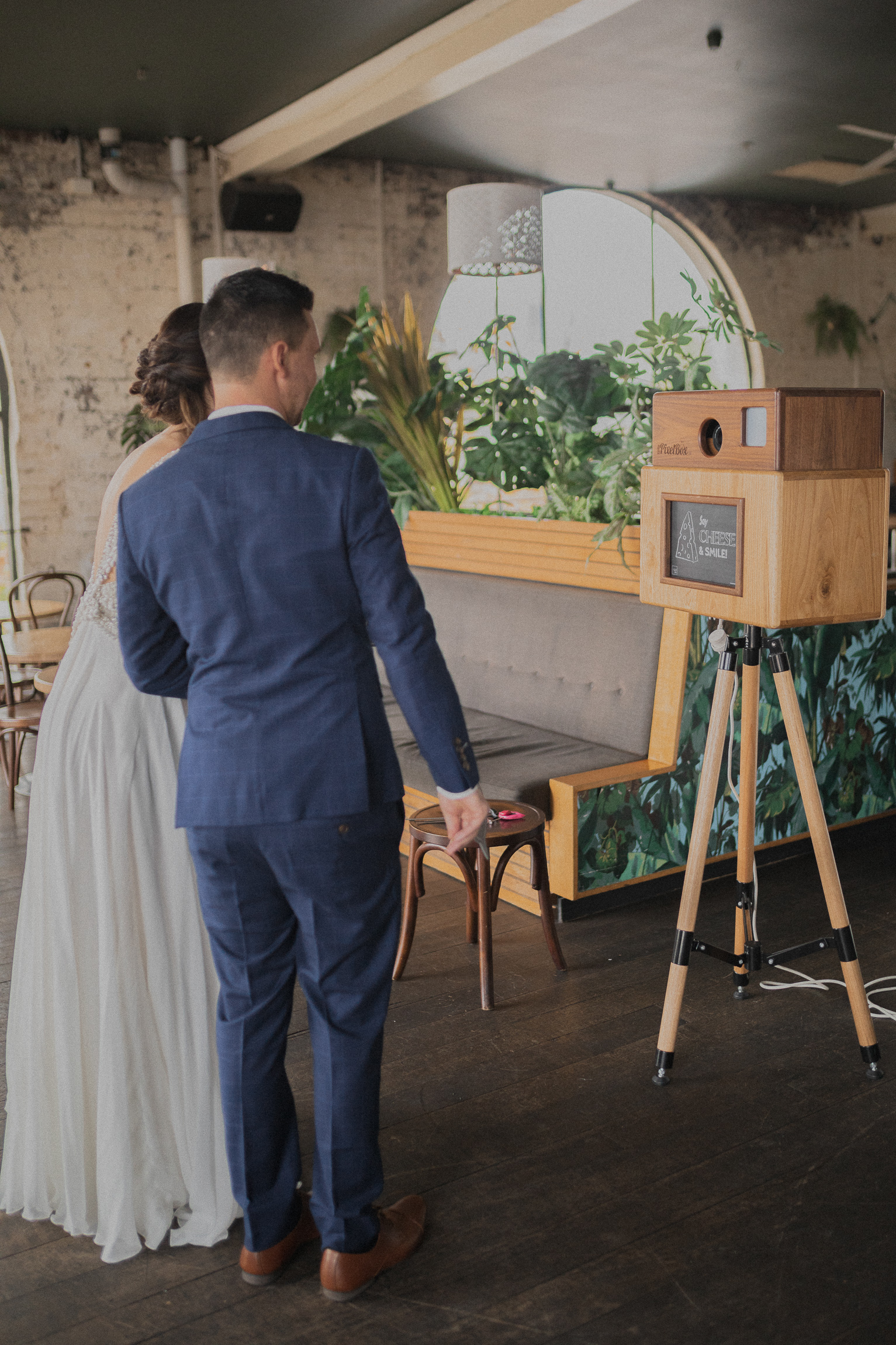 Bride & Groom at Booth.jpg