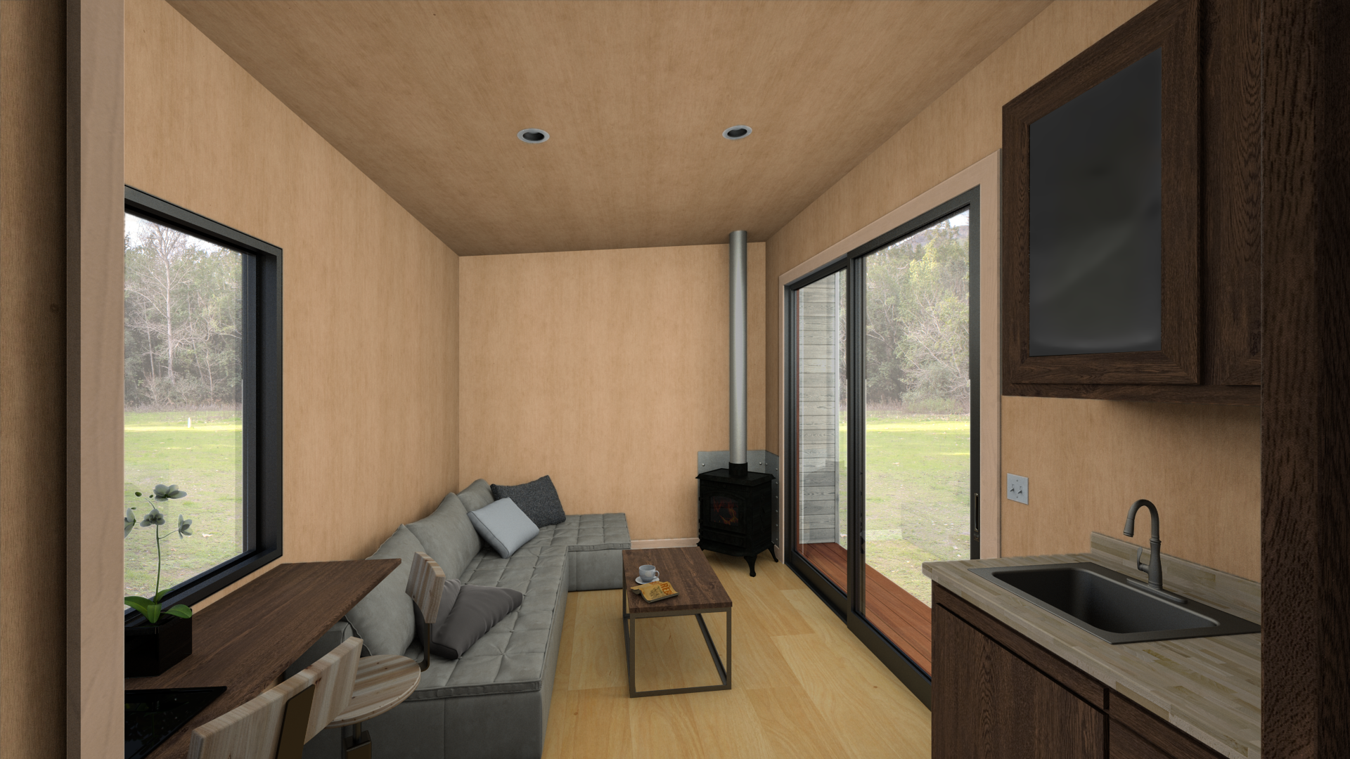  The interior is a blank canvas, shown here configured as a guest suite with the optional wood stove and kitchenette. 