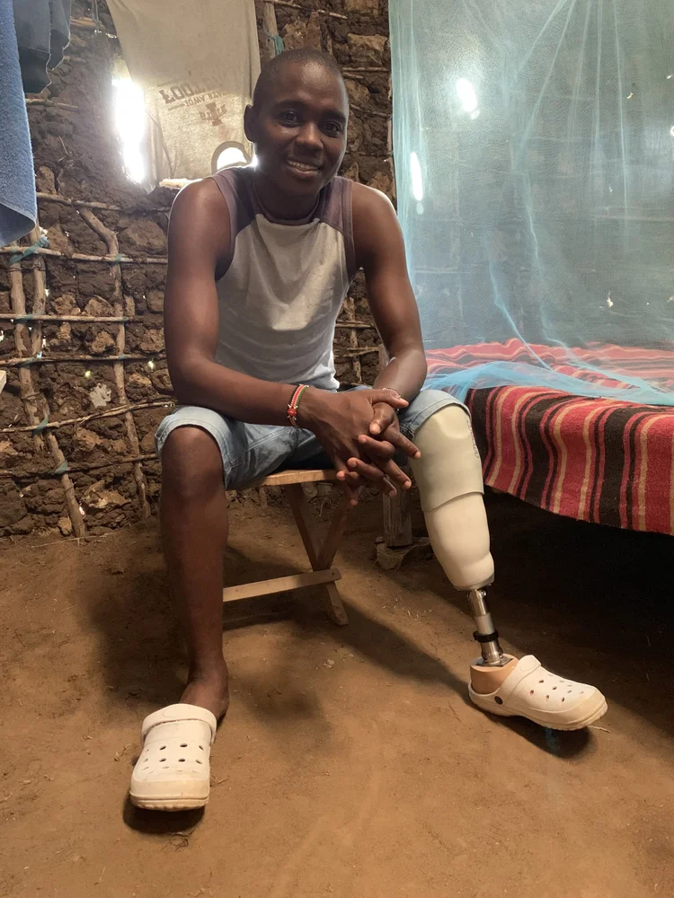 Arnold wearing his Confidence Socket at home in Malindi.
