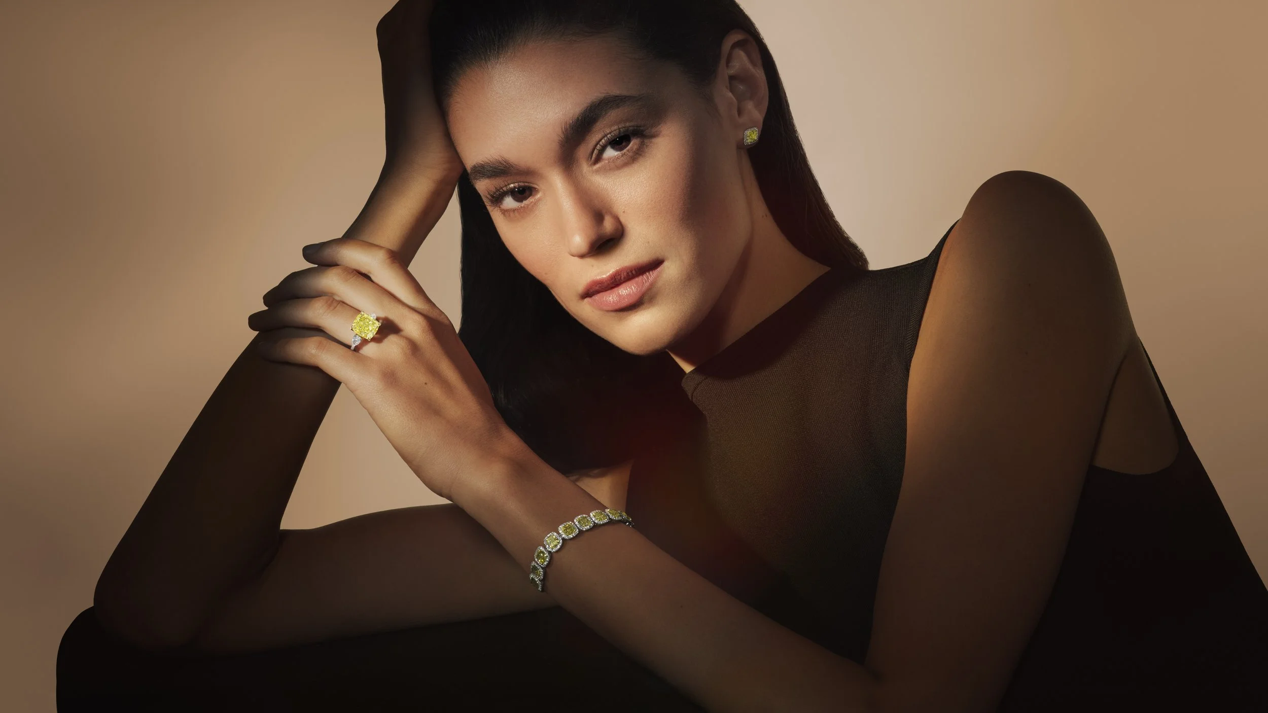 DeBeers_DA_Worn Still_Yellow Cushion_RGB copy.jpg