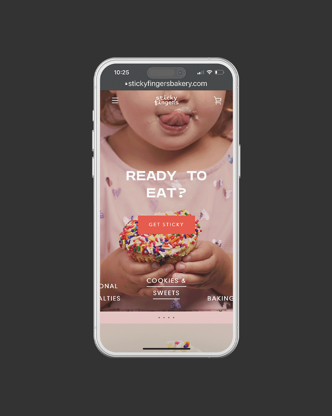 Mobile phone screen displaying a bakery website with a young child licking their lips and holding a sprinkled donut; text says "Ready to eat?" and a button labeled "Get Sticky".