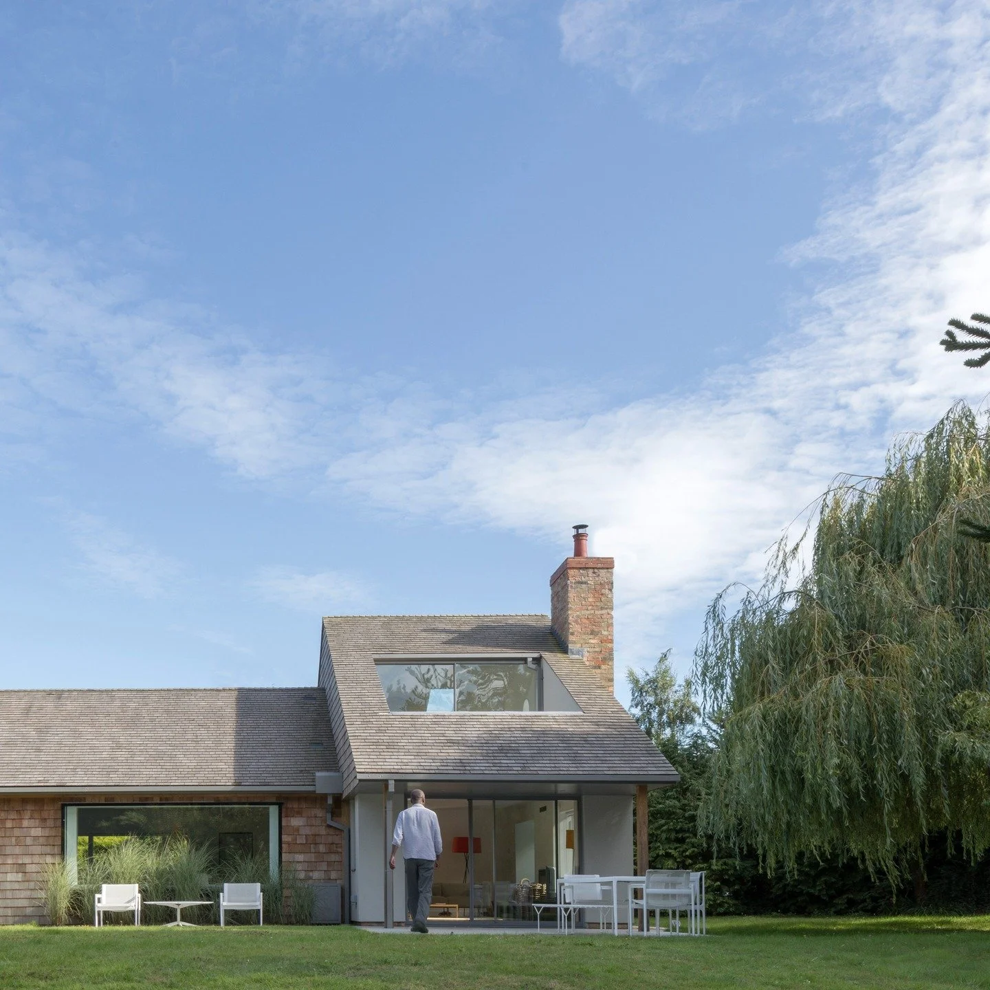 The reworking of a Colt House

The original house is a timber-framed Colt House, later extended in the 1990s with a two-storey brick addition. 
Our clients sought to modernise the home, rationalise the layout and improve connections to both the entra