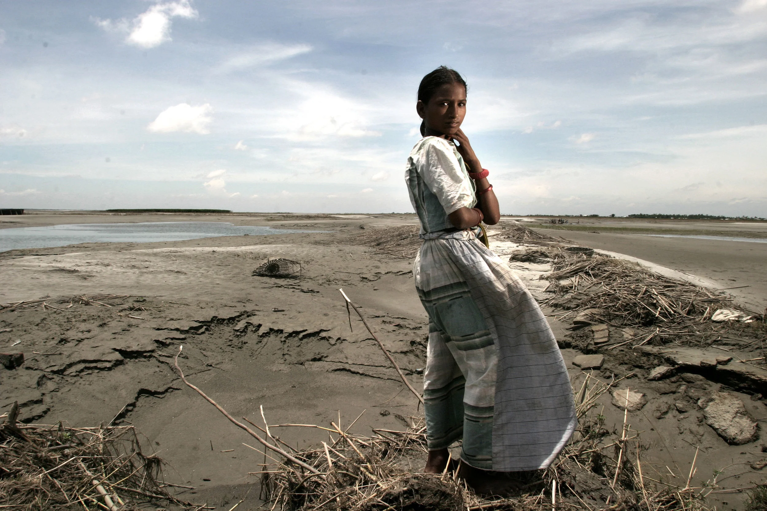 I saw her standing there, she couldn't speak, this had been the sight of her home that was swept away in the flood. Bangladesh; worst flooding in 20 years.