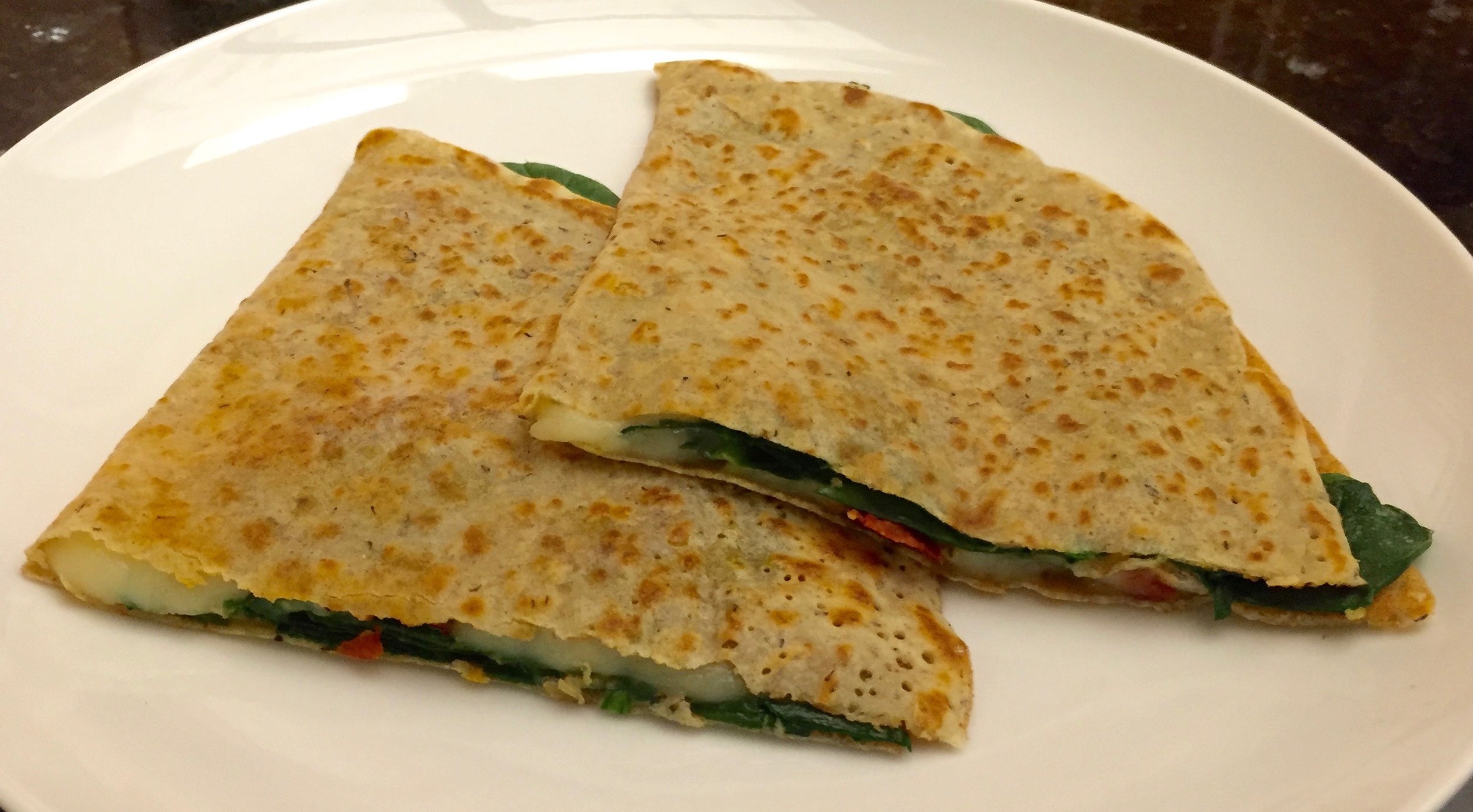 Crepes with Spinach, Mozzarella, Pesto, and Sun-Dried Tomatoes