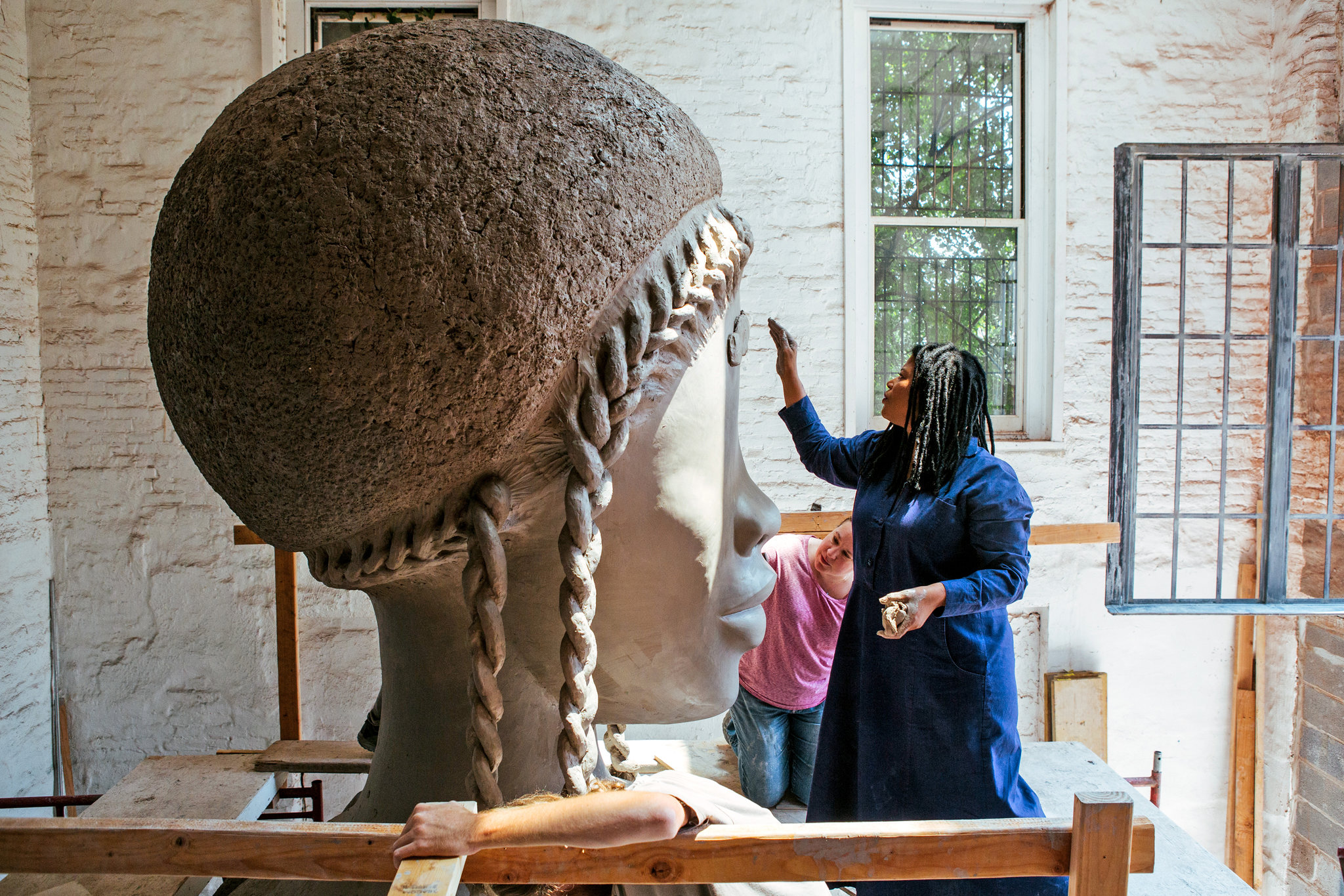 A close up of Leigh’s cornrow designs in progress (Courtesy The New York Times )