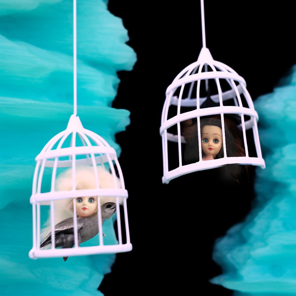 Paige and Ginger's heads in bird cages
