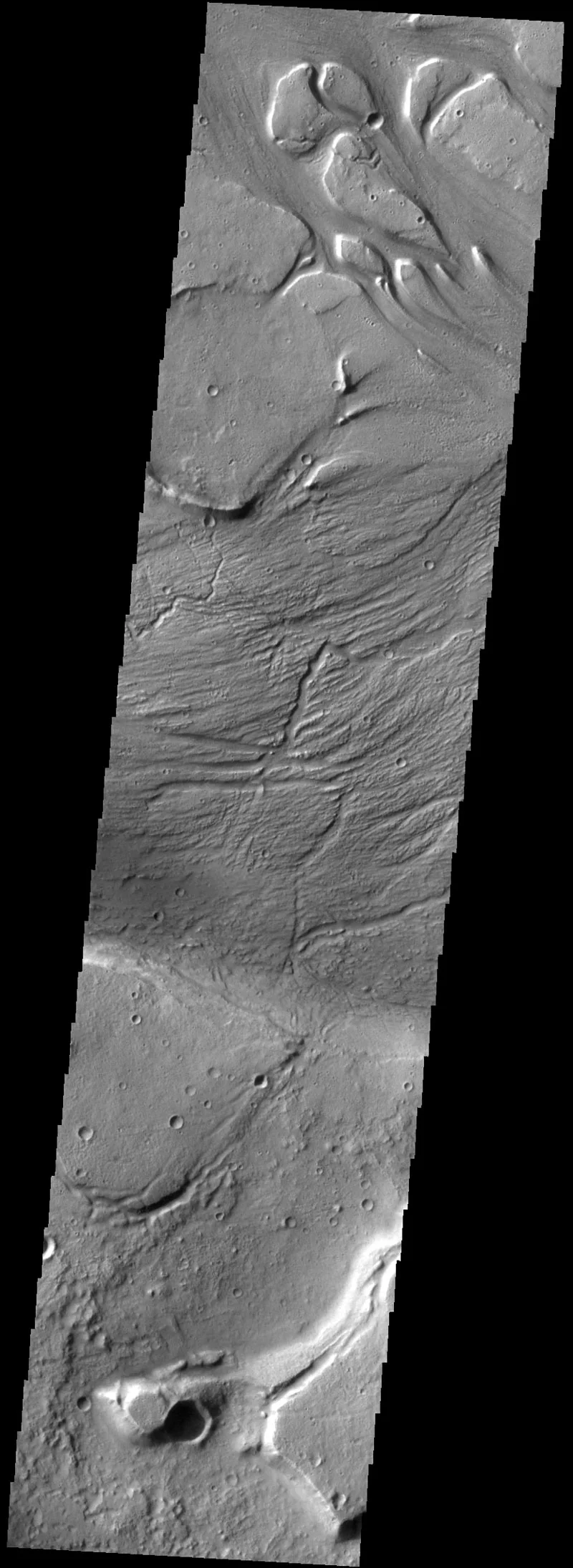 This series of images stitched together as one, show several interpreted streamlined islands in Kasei Valles near the 'mouth' of the outflow channel where it empties out onto a volcanic plain. The supposed tear-drop-shaped island features can be seen near the top of the image. Such features are commonly seen in river channels across Earth, which leads some scientists to believe these features are supporting evidence that Kasei Valles is a series of river channels. Though, as we'll discuss in Part 2, such features can also be created by wind deposition, as well as turbidity flows. As a personal note, I believe this image shows good evidence of water flow, but it is also important we remember gravity, atmospheric pressure, etc. are nothing like they are on Earth, and as such we should be very careful about how we interpret things that might look the same as similar features on Earth, but could be completely different. One might best represent this image as saying it looks very much like (fill in the blank), rather than saying this absolutely is (fill in the blank). The distinction is critical, and representative of current understanding. That's science. With that said, I think this is strong evidence for past water flow. Image Credit: NASA/JPL