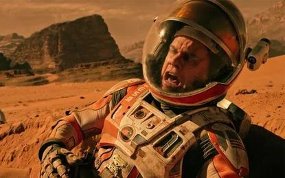 Mark Watney suffering from a tummy ache.