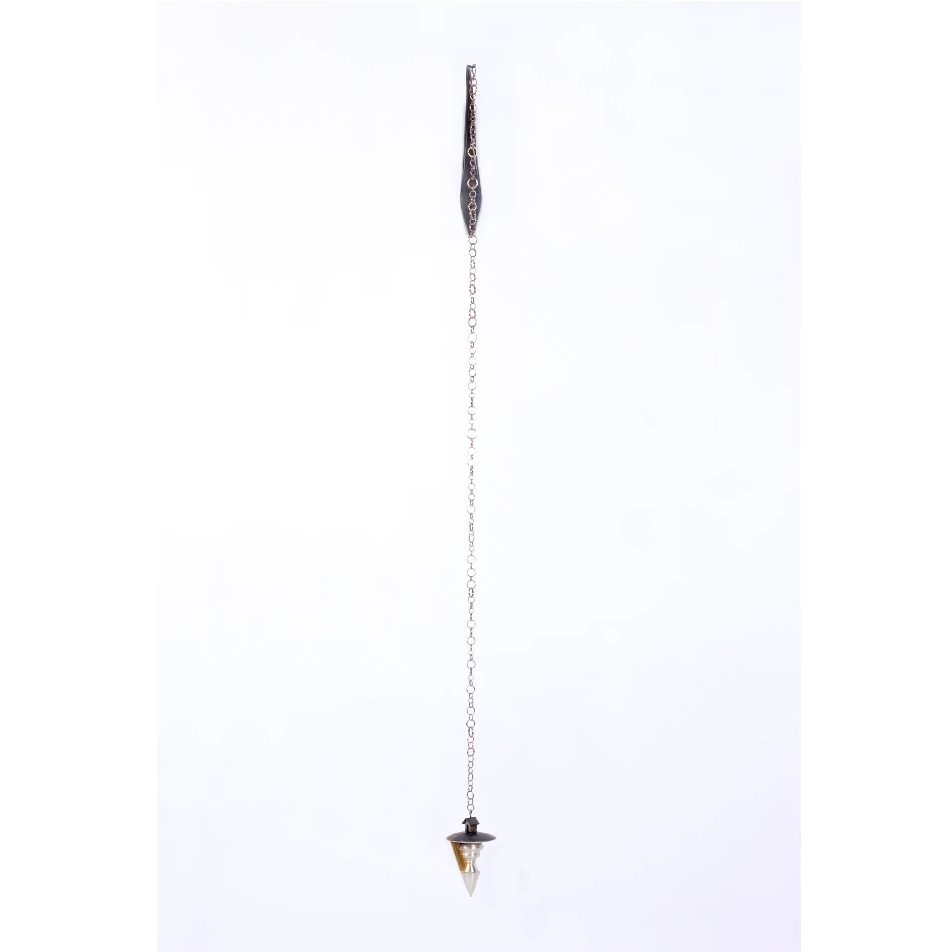 Shelter is based on the form of a plumb bob - a device for finding a true vertical line. Similarly, the need for dependable shelter is a significant element in decision-making.