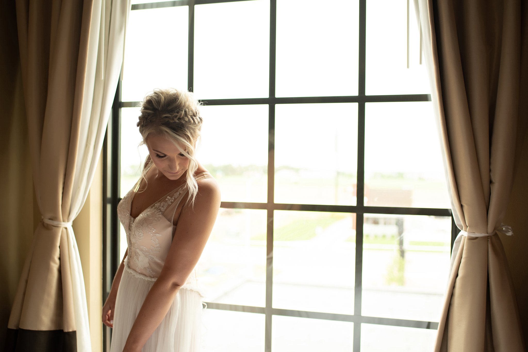final touches on bride getting ready