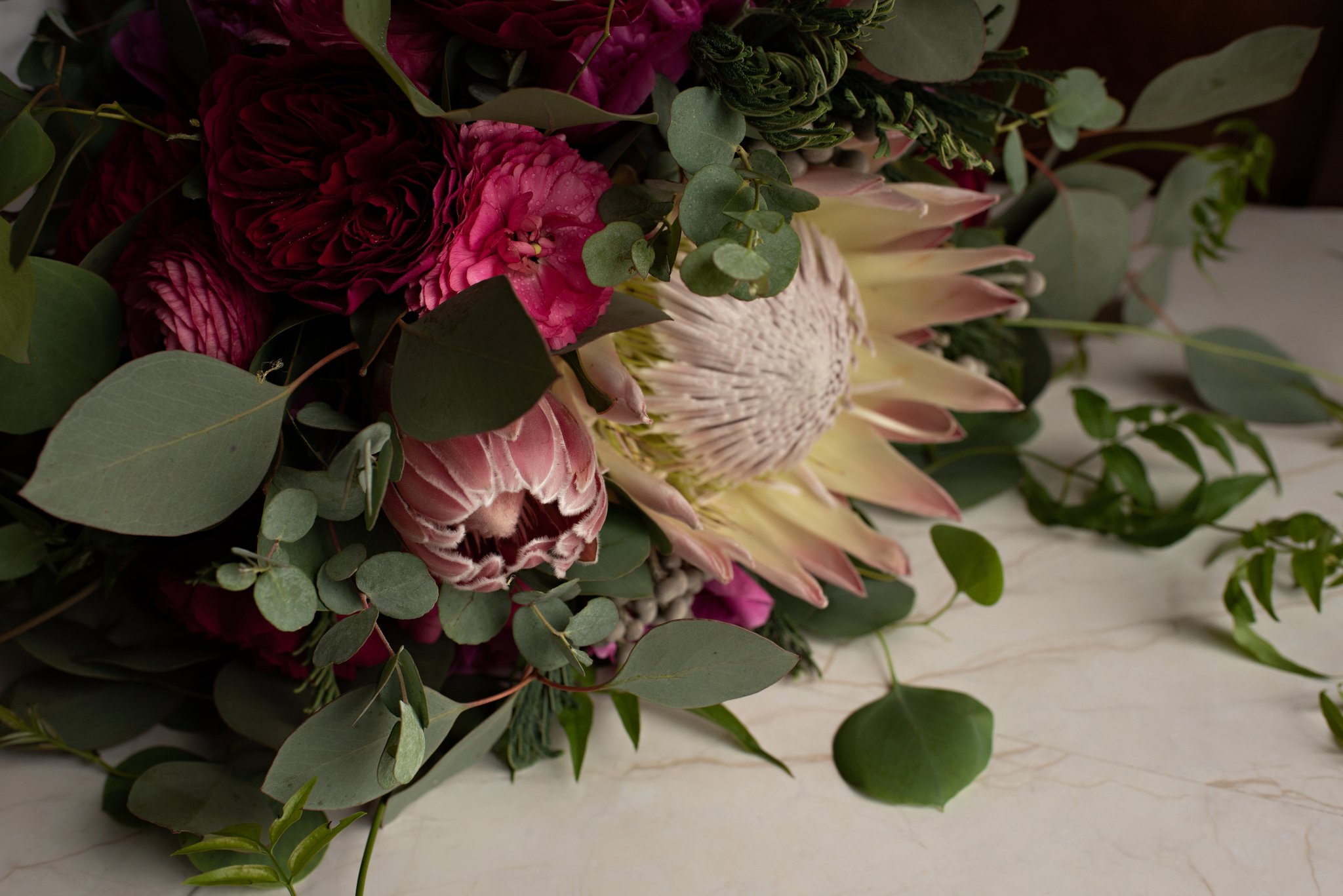 exotic boho wedding bouquet with fuchsia