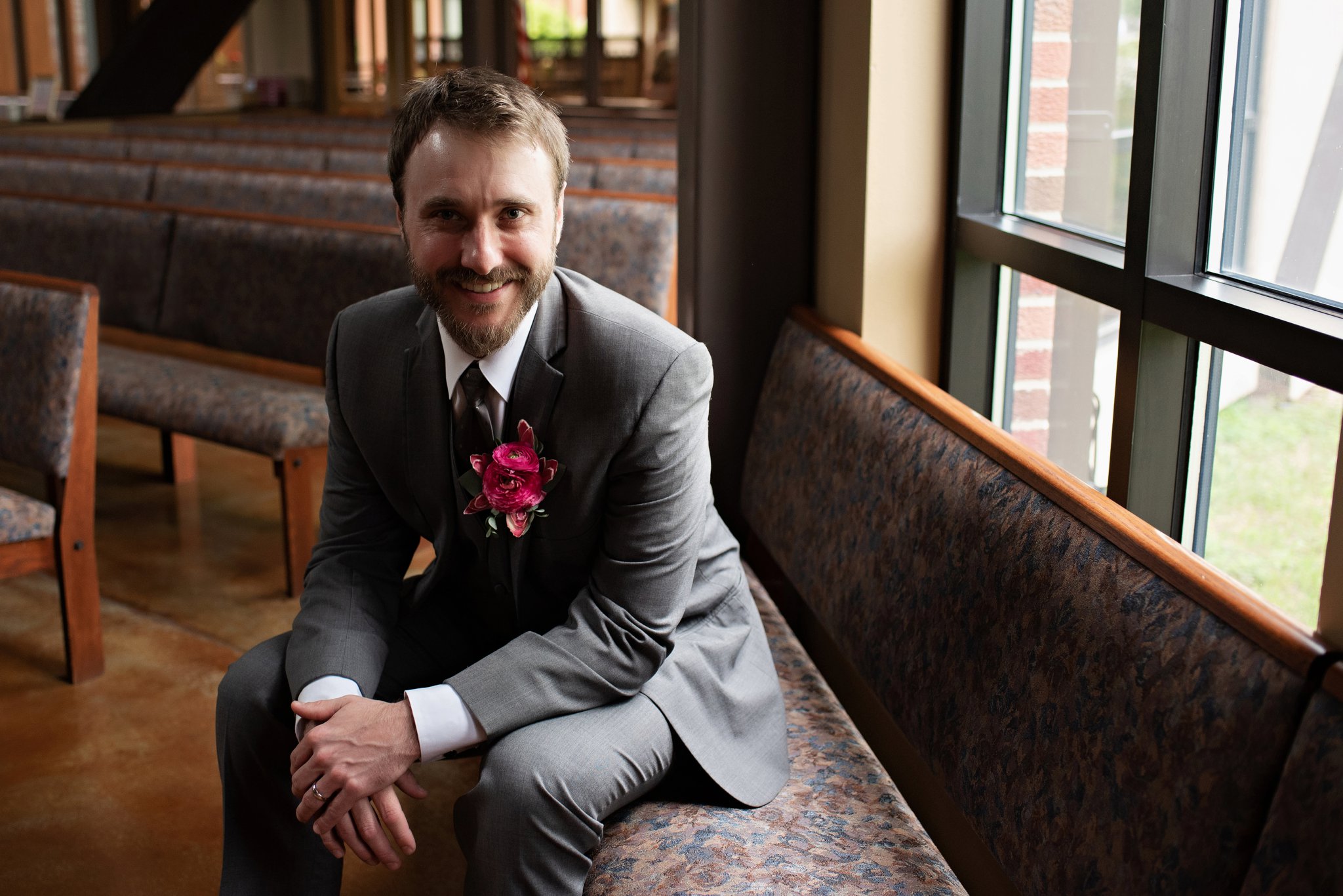 groom informal portraits inside the church