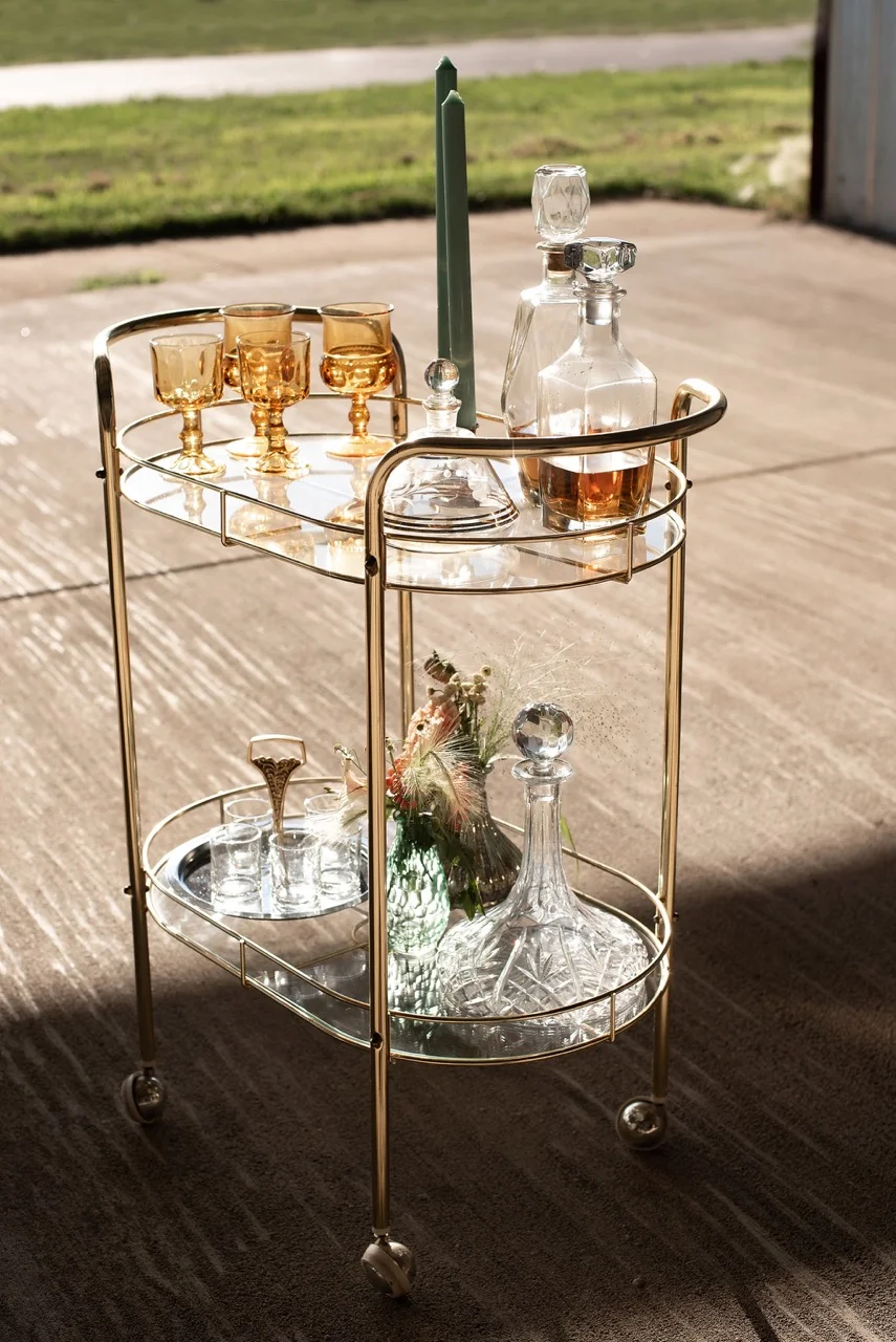gold and glass bar cart