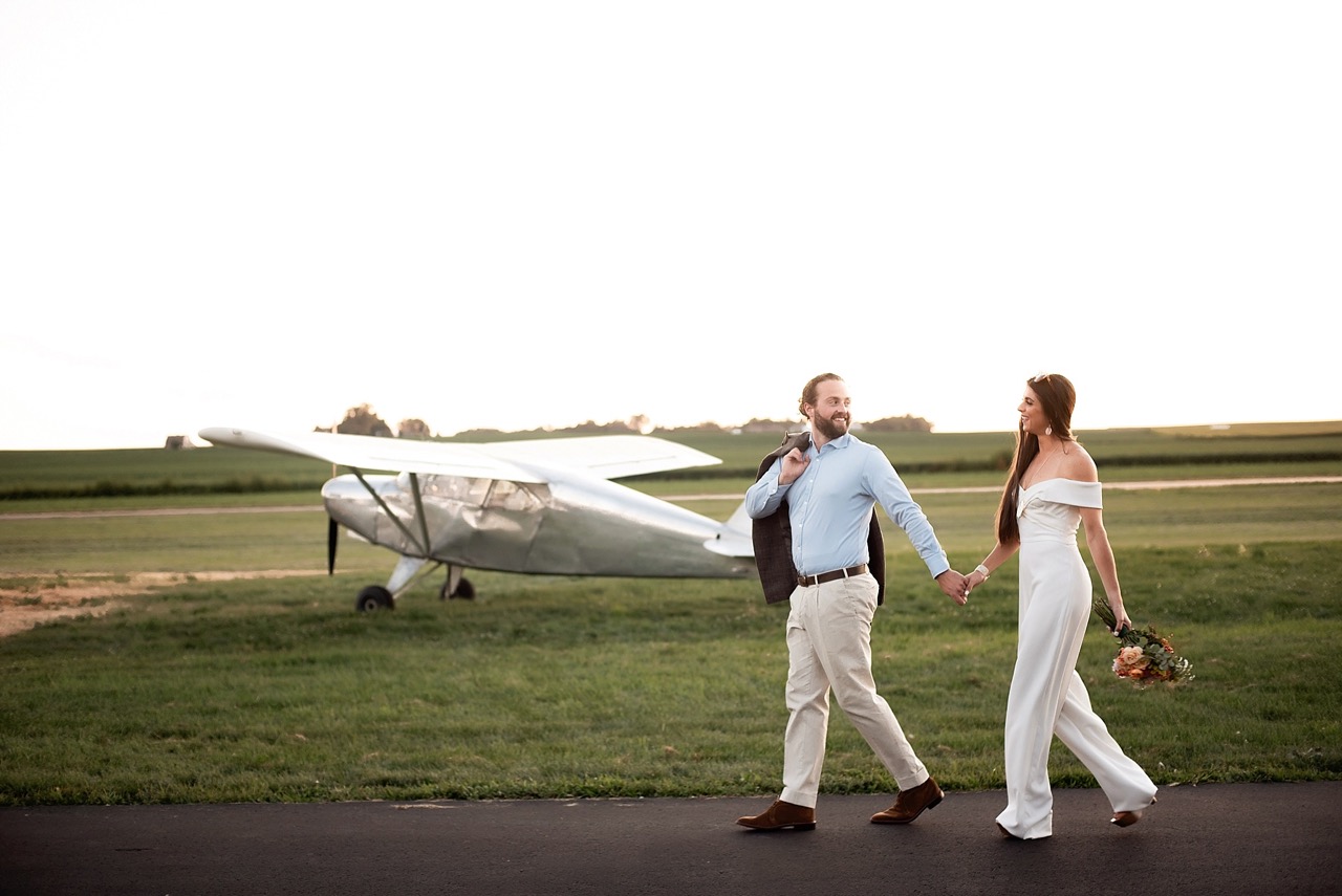 off the shoulder ivory jump suit getaway outfit for bride