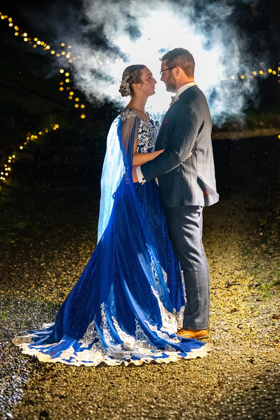 Backlit couple portrait with smoke
