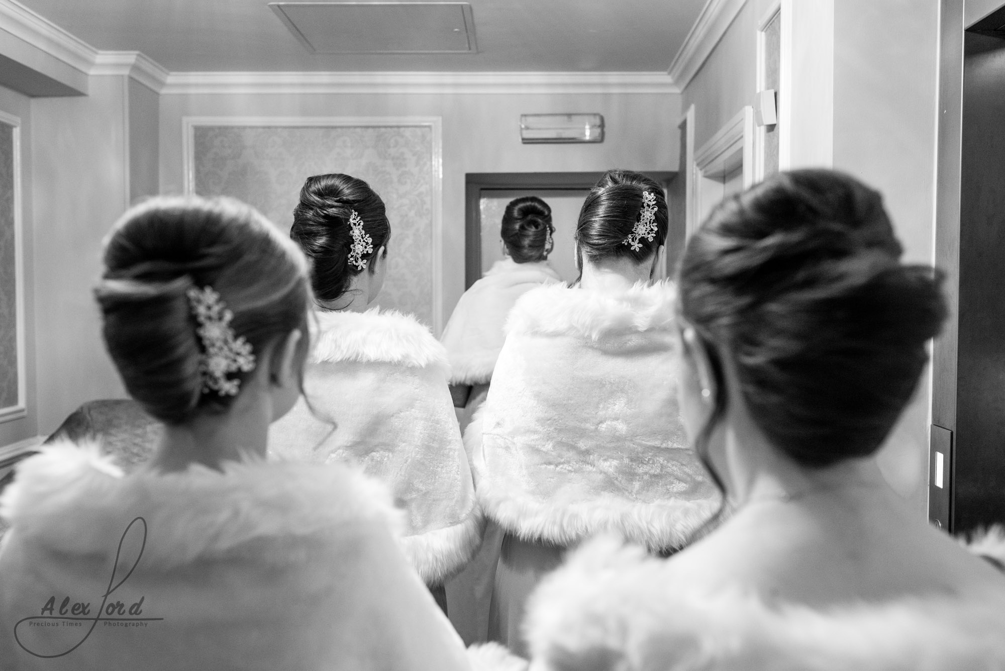 Shropshire wedding photographer captures the bridesmaids waiting outside the ceremony room