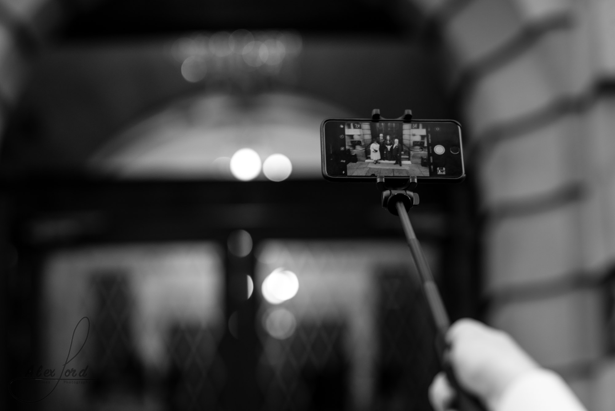 a wedding guest takes a selfie in front of the richmond hotel liverpool