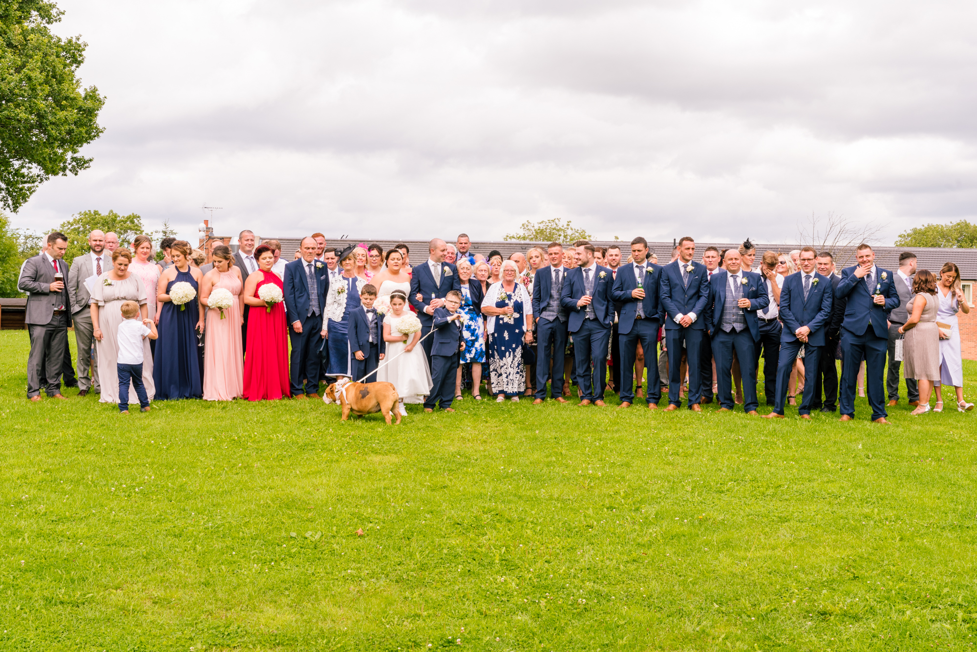 all the guests gather for a full group photo