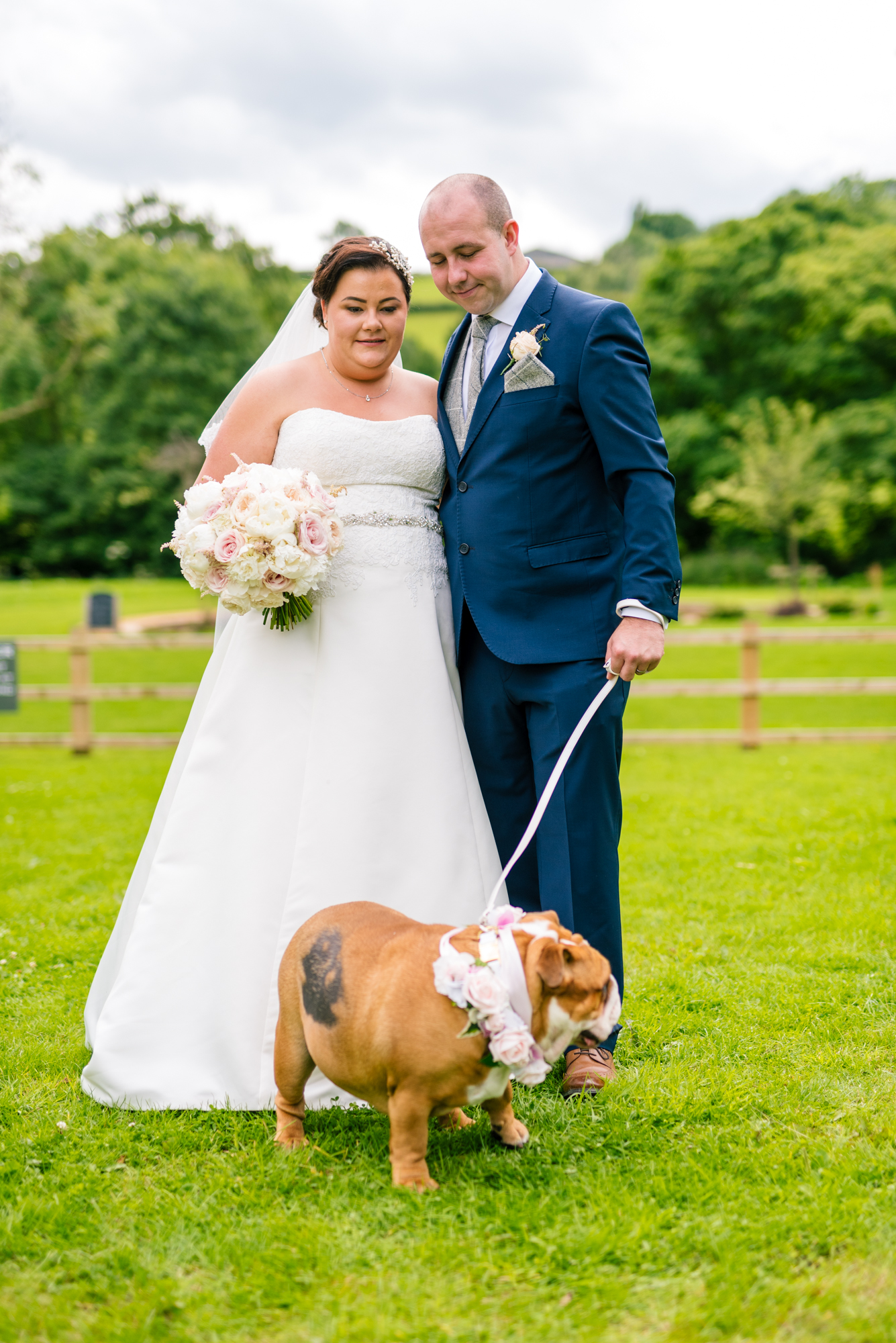 bride and groom with their dog