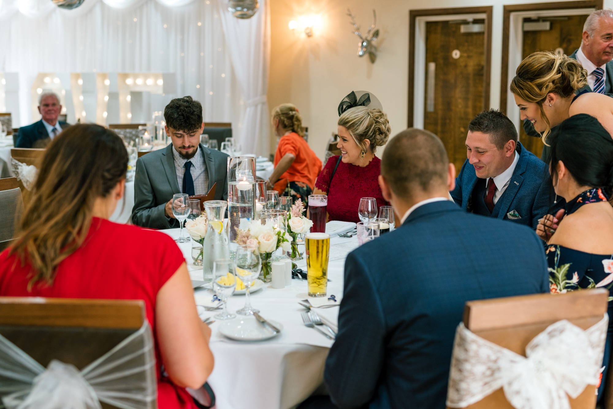 guests sit down to eat