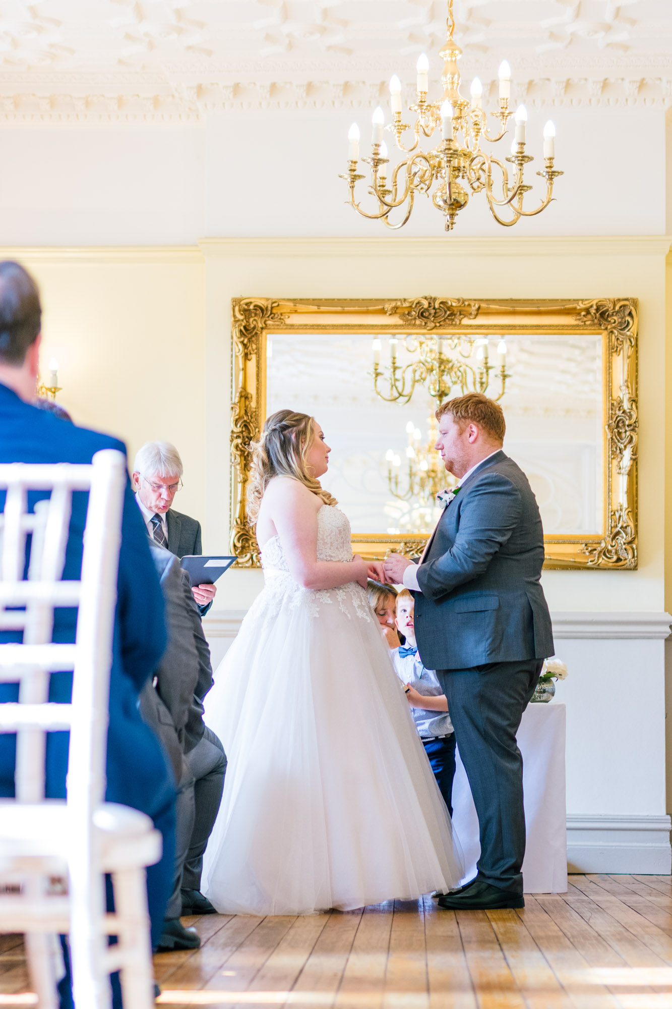 Bride and groom exchange rings