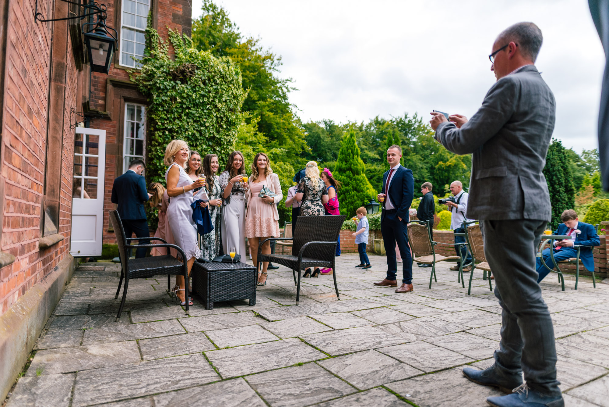 Guests taking photos outside nunsmere hall