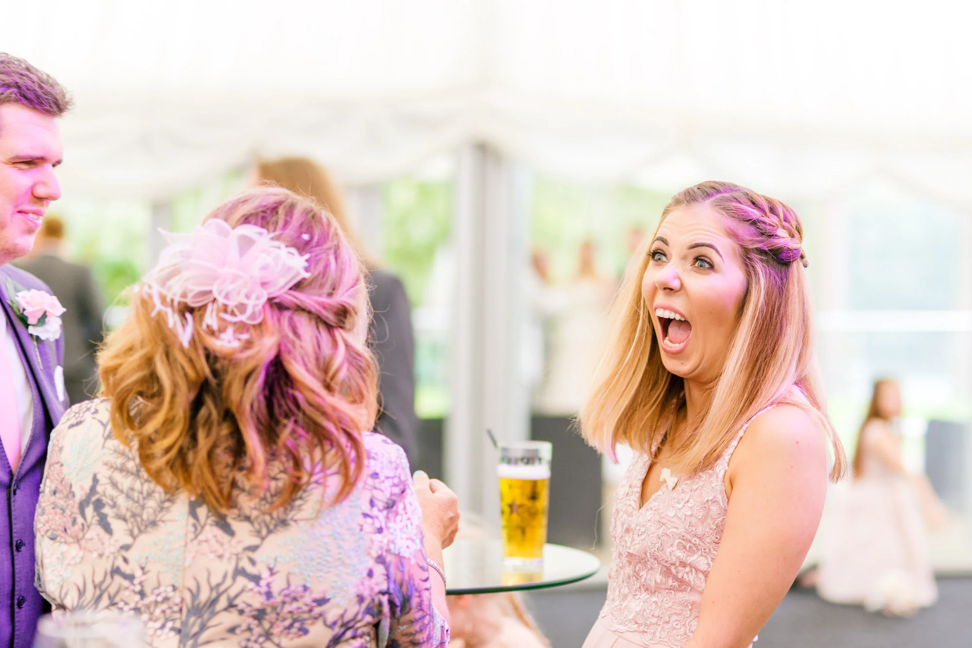 Wedding guest having a laugh