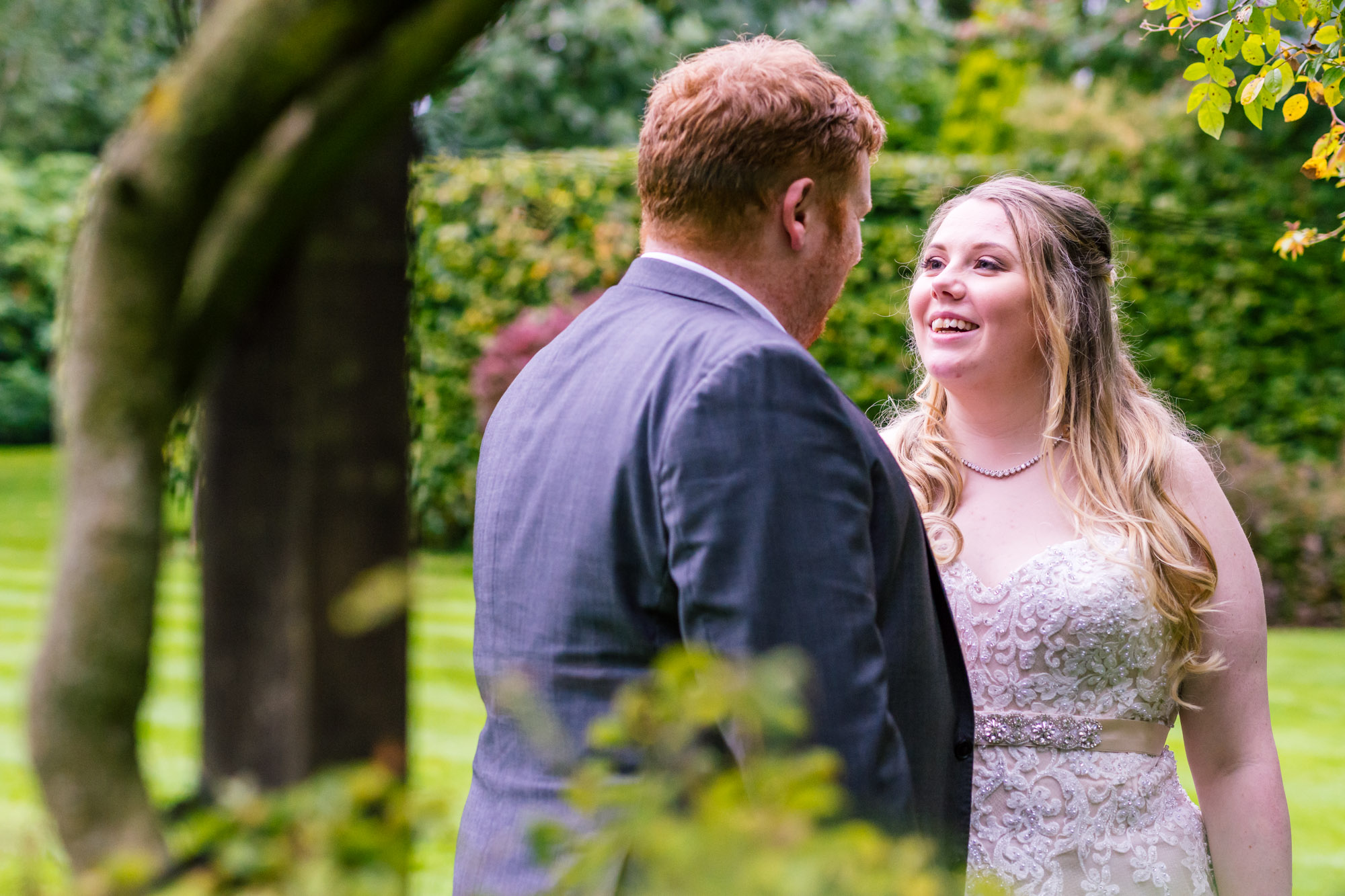 bride and groom have a giggle together