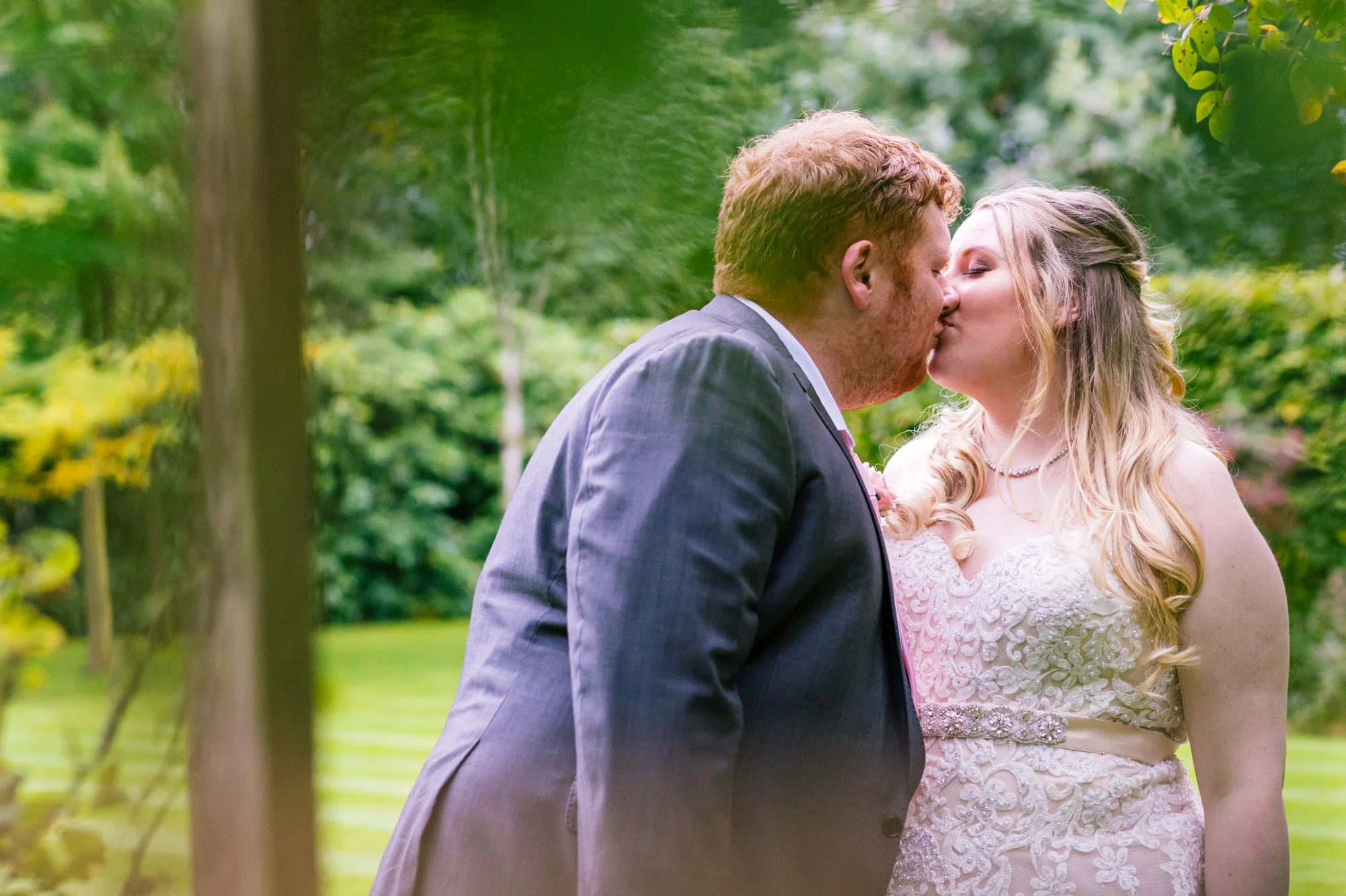 bride and groom have a kiss