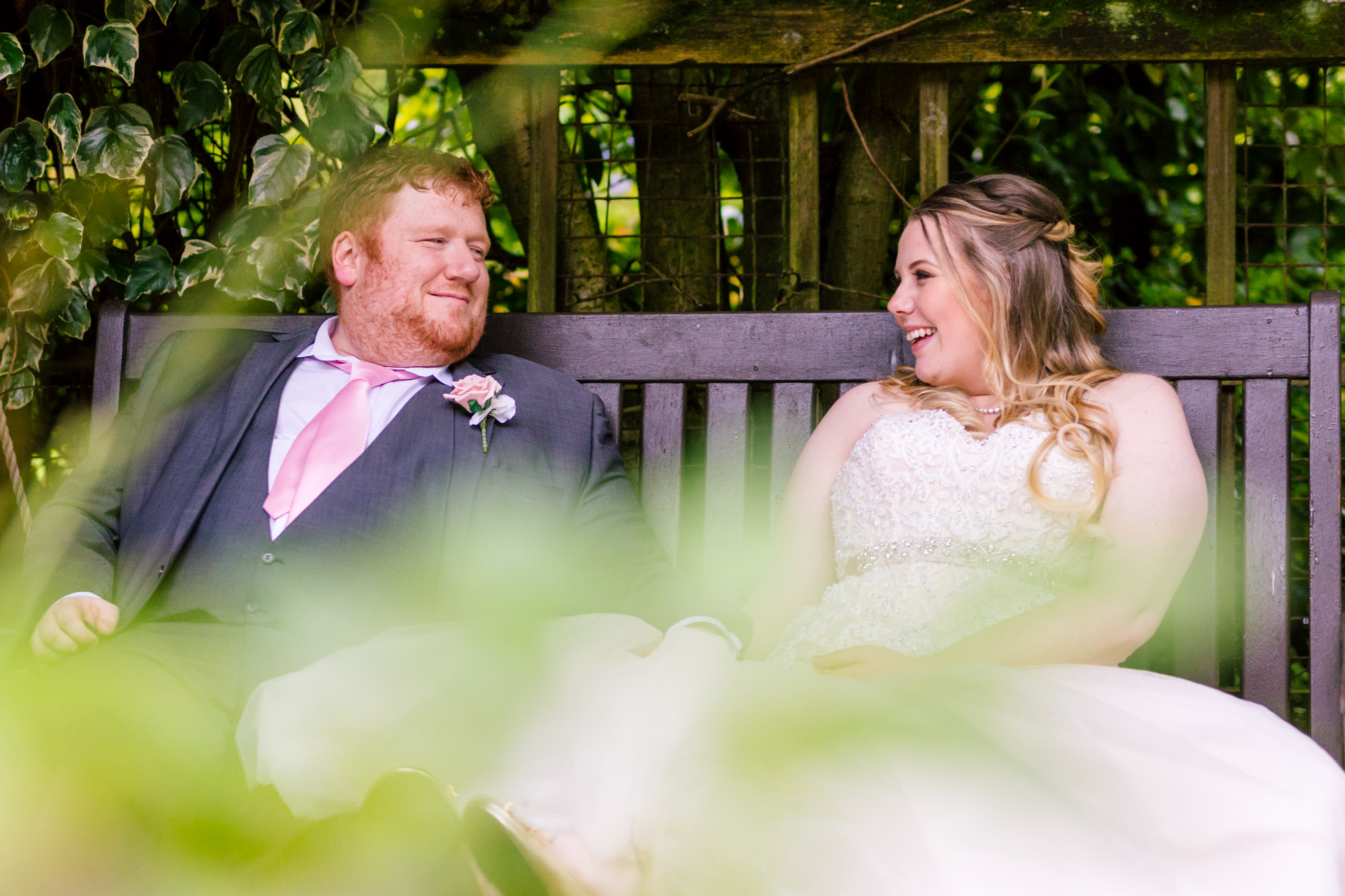 the bride and groom relaxing together