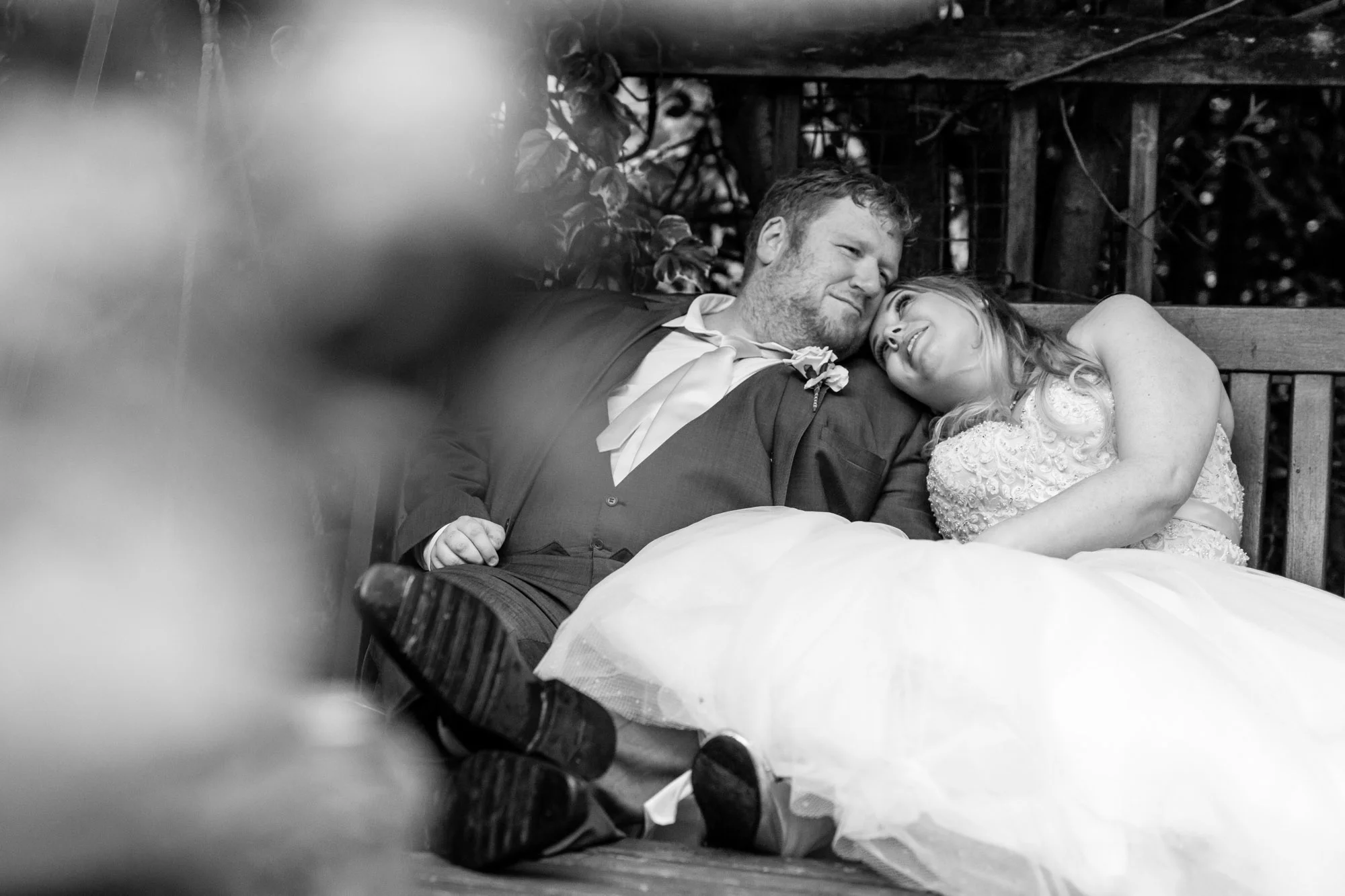 bride and groom having a cuddle