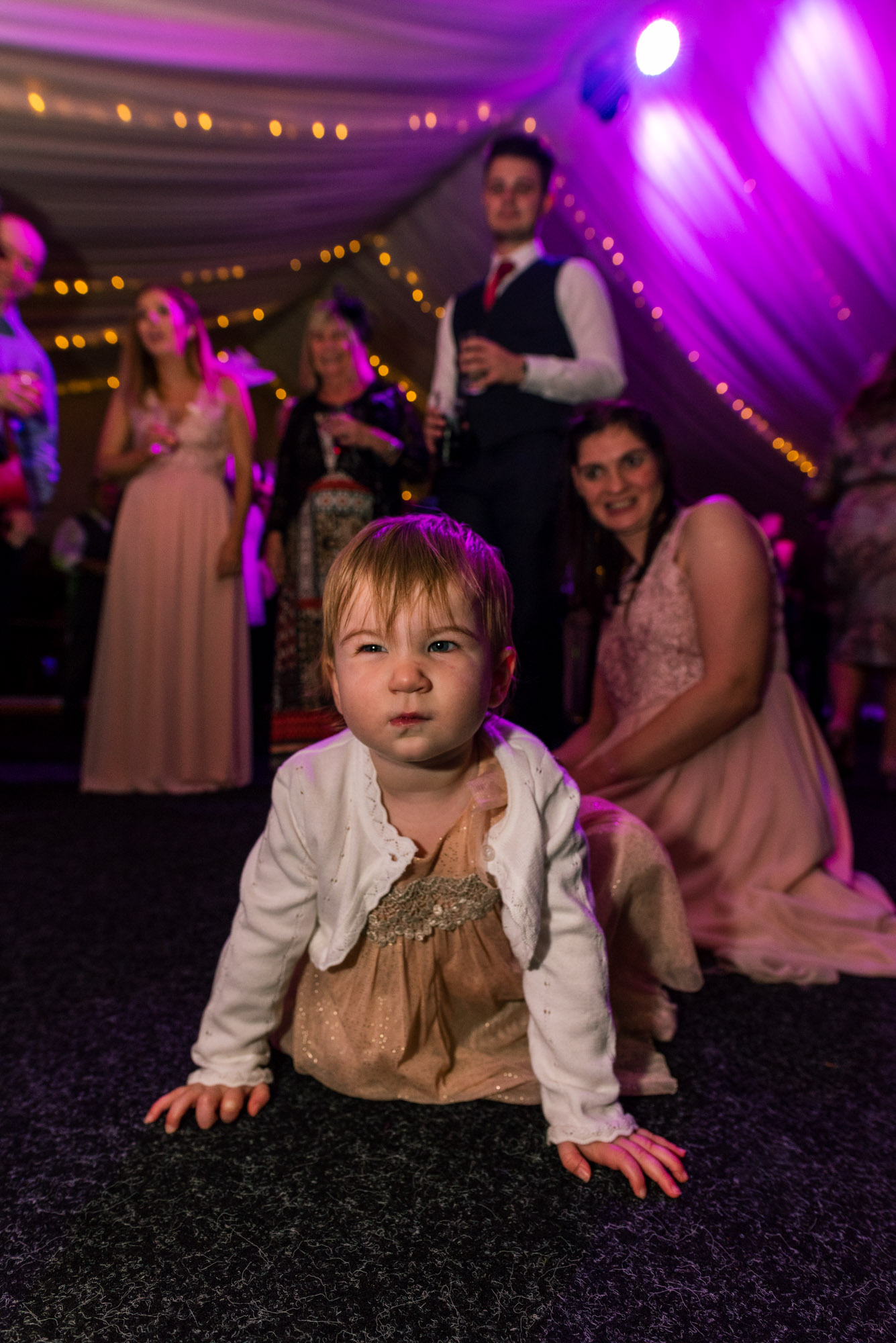 child playing on the dance floor