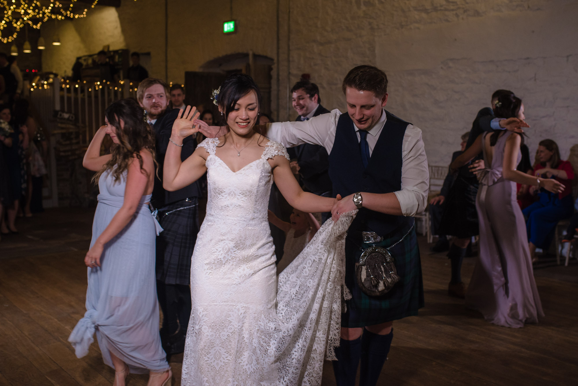 The bride and groom dance the gay Gordon’s at Askham Hall.