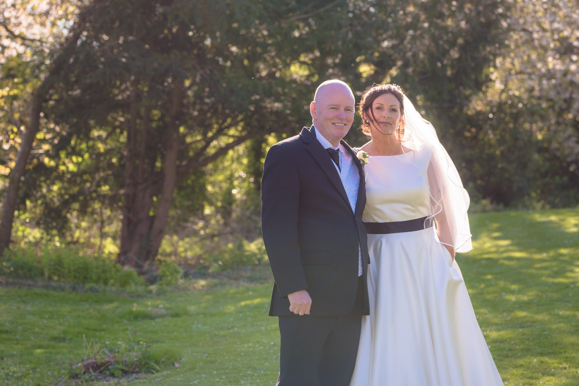Bride and groom in the sun