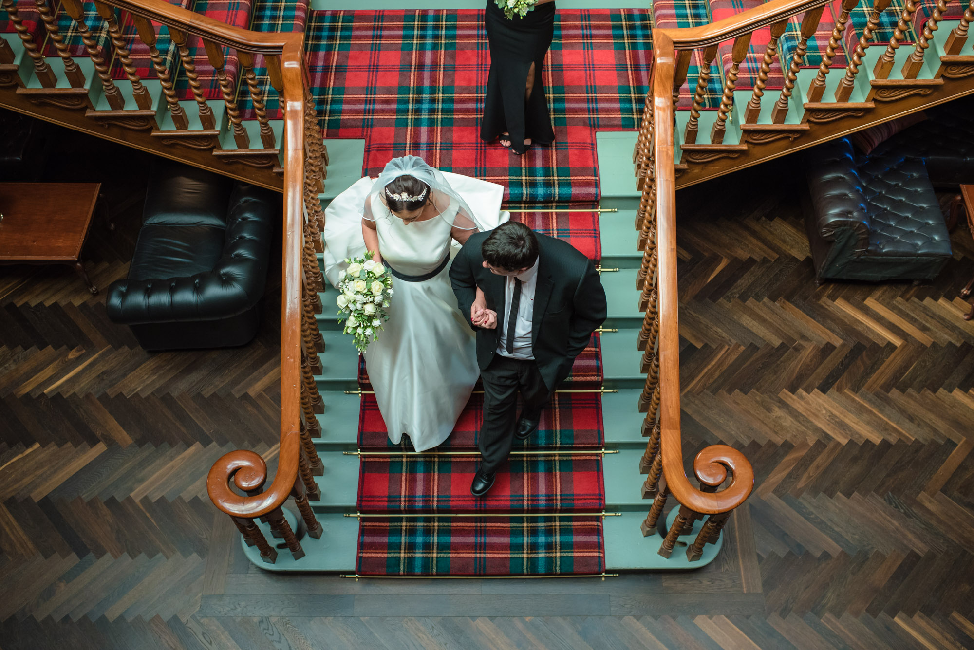 Bride and her son going down the stairs