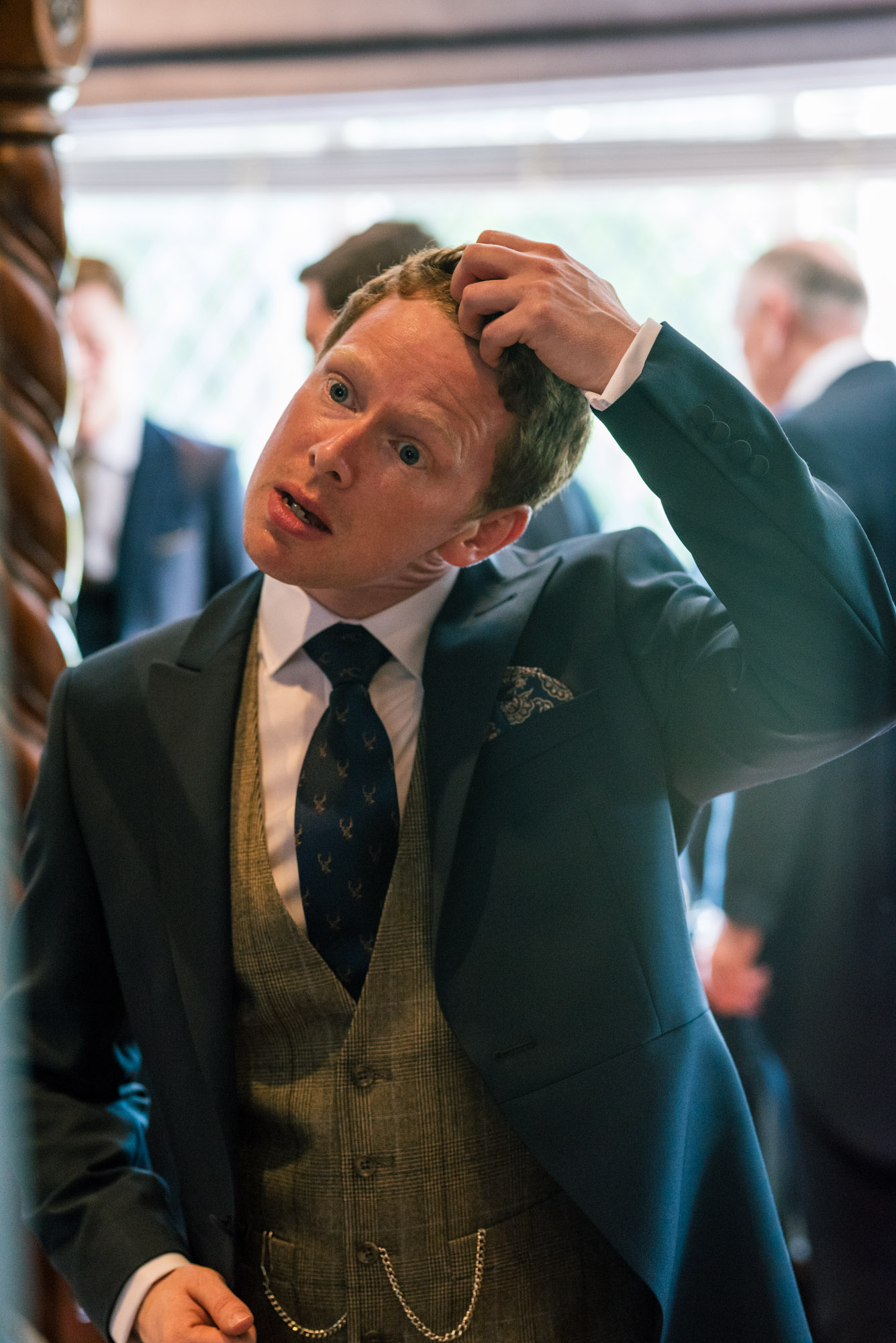 Groom sorting his hair