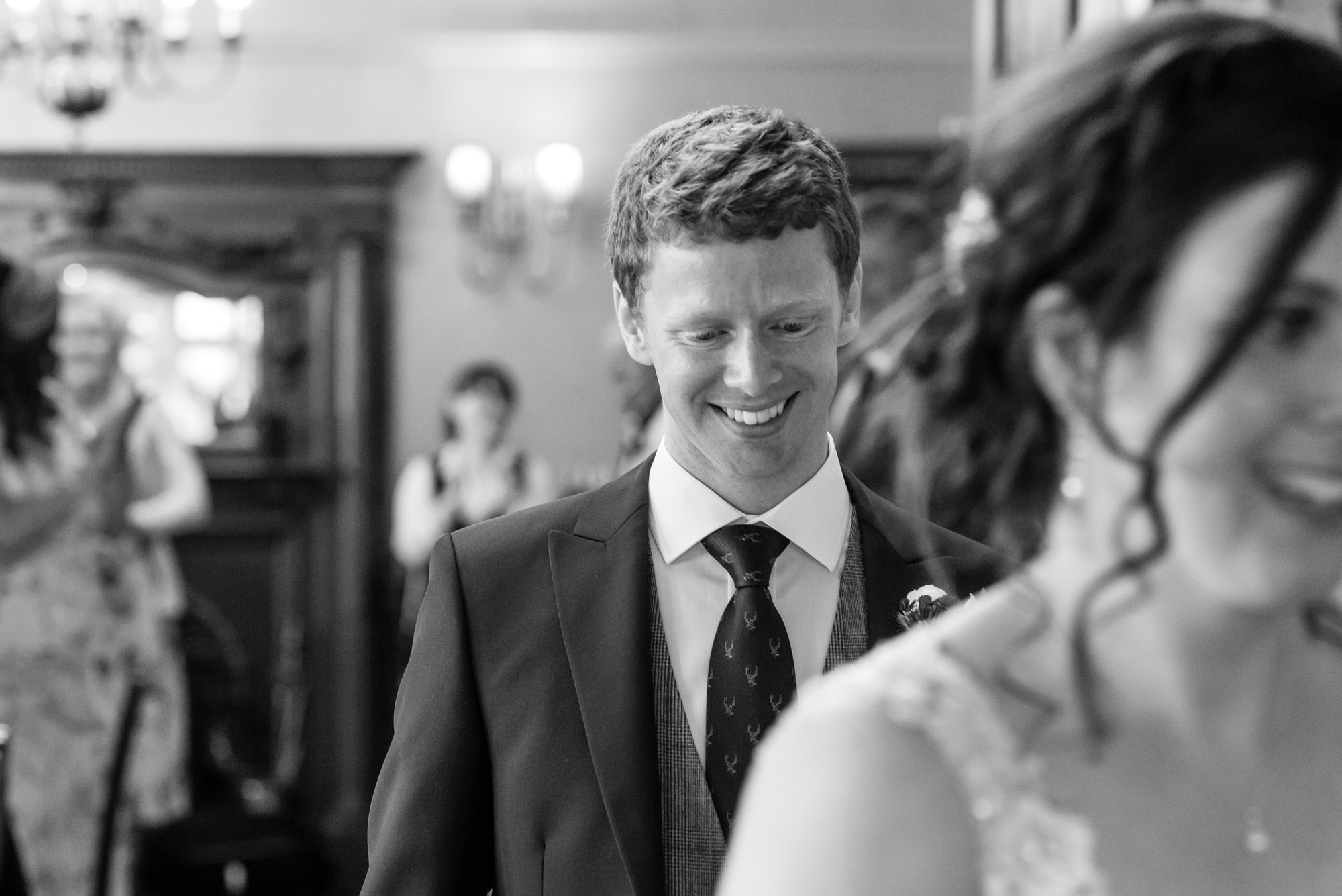 Groom following his new wife to the top table