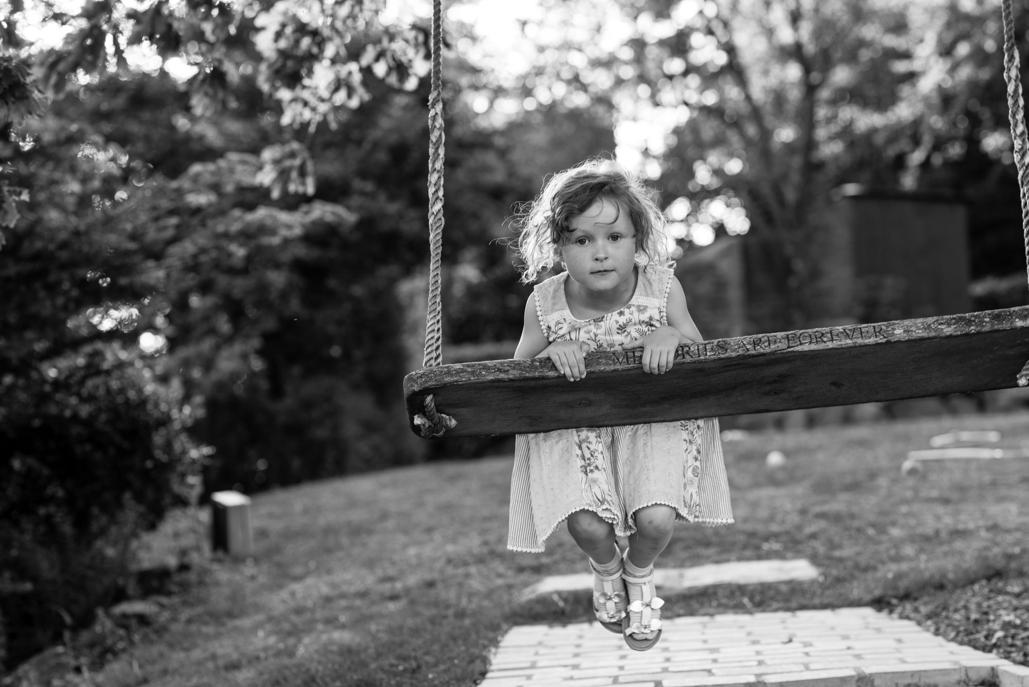 A young guest plays on the swing