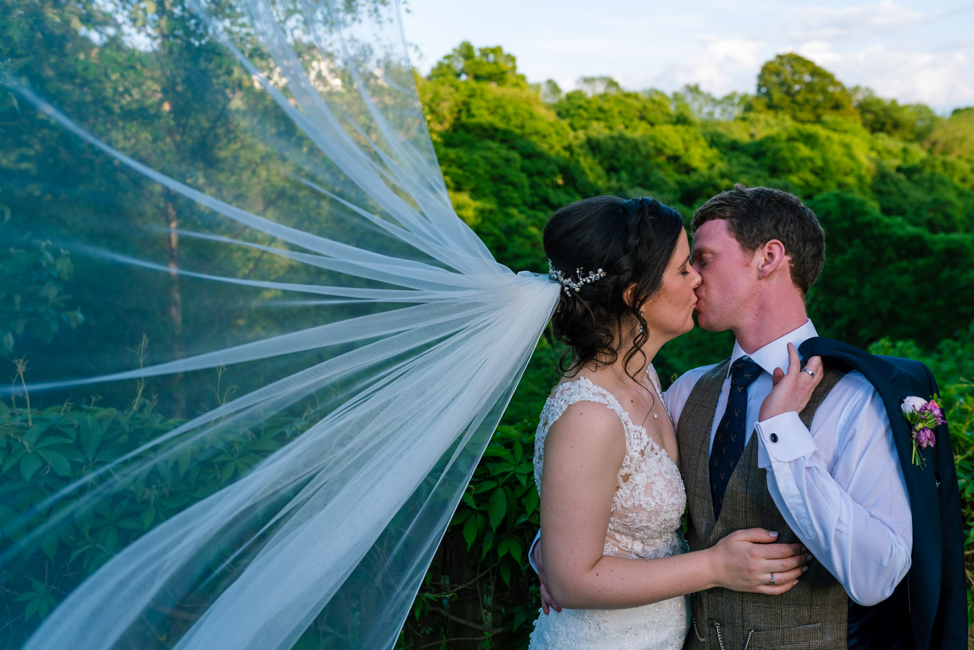 Couple portrait with the veil