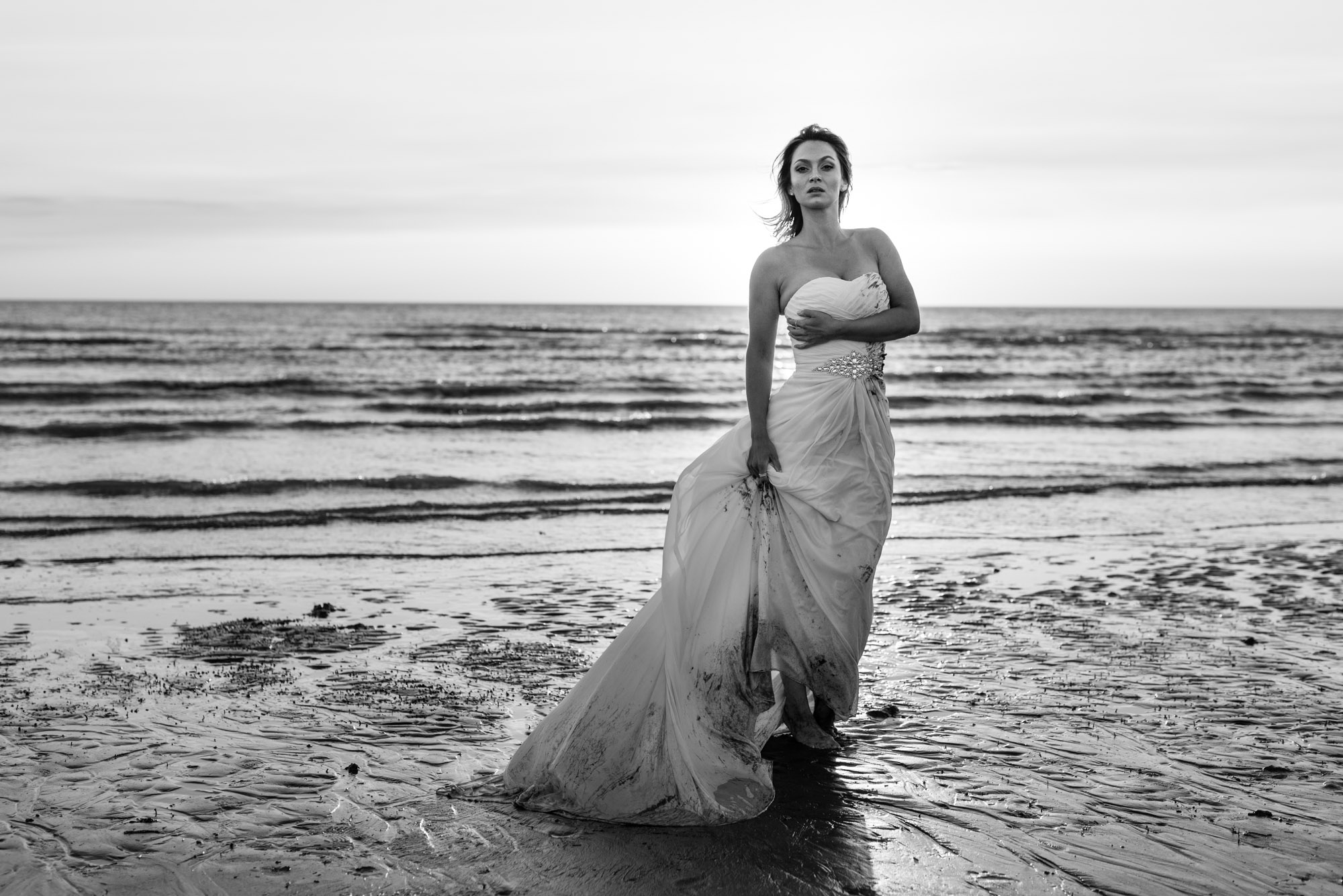 Bride at the water's edge