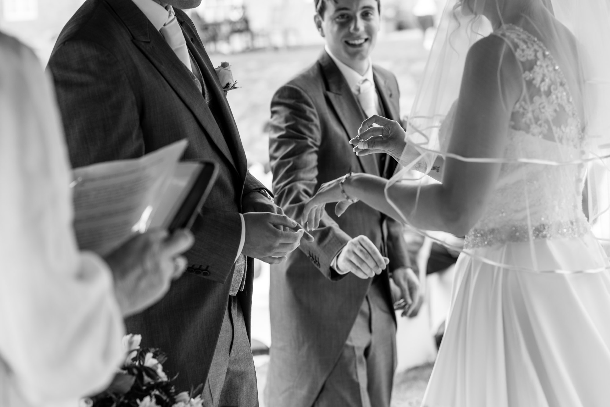 Best man hands over the rings