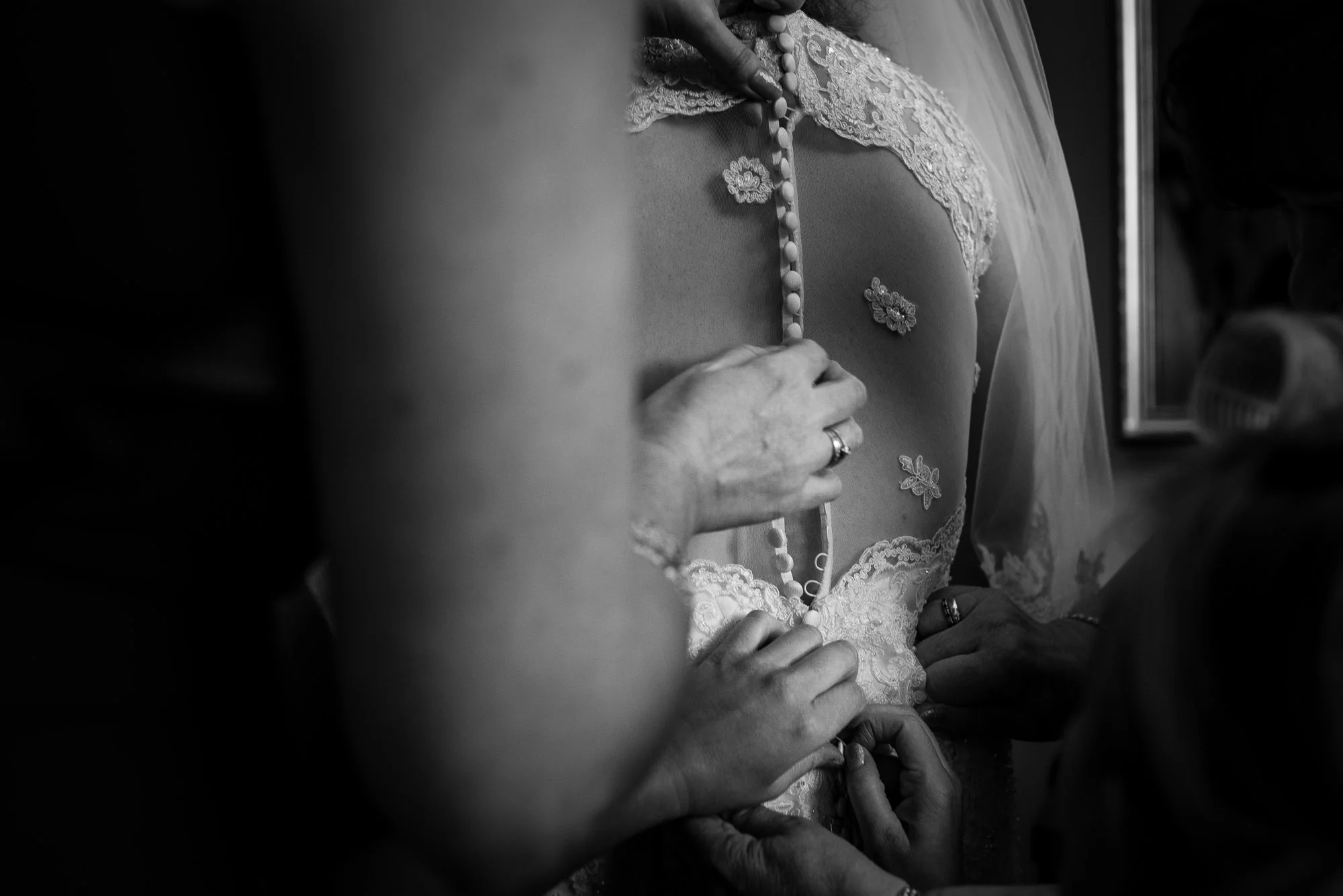 Detail of doing up the dress