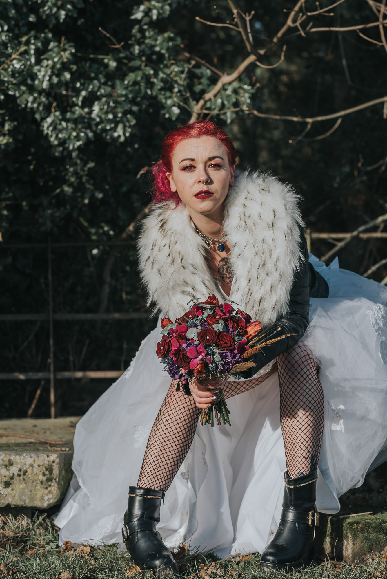 Bride with her bouquet in the sun
