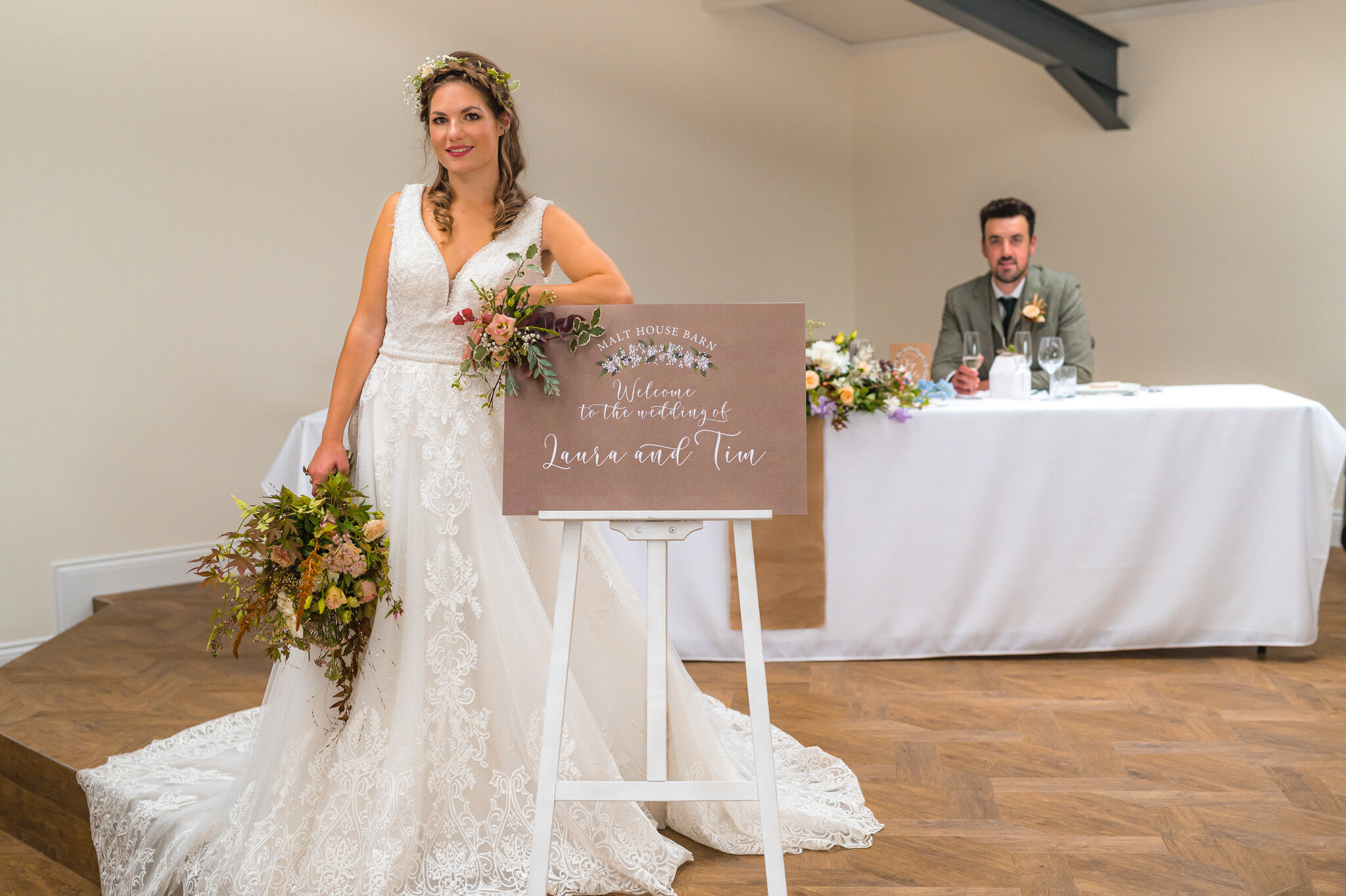 Bride and groom and sign