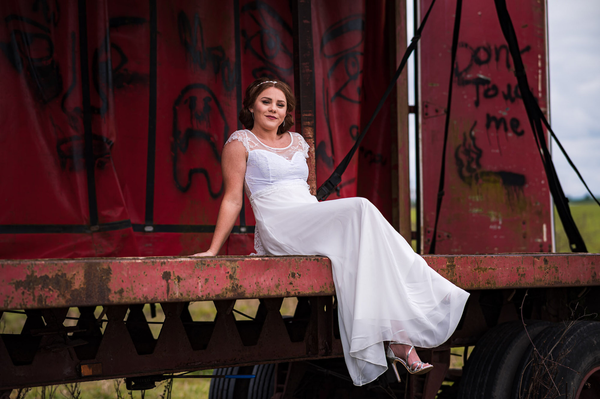 Bride sitting on a trailer