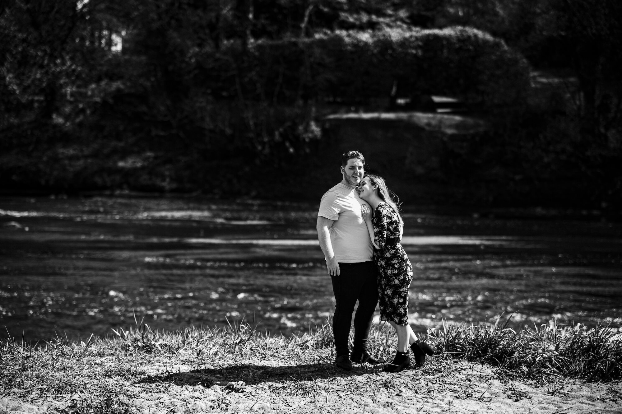 Couple by the river