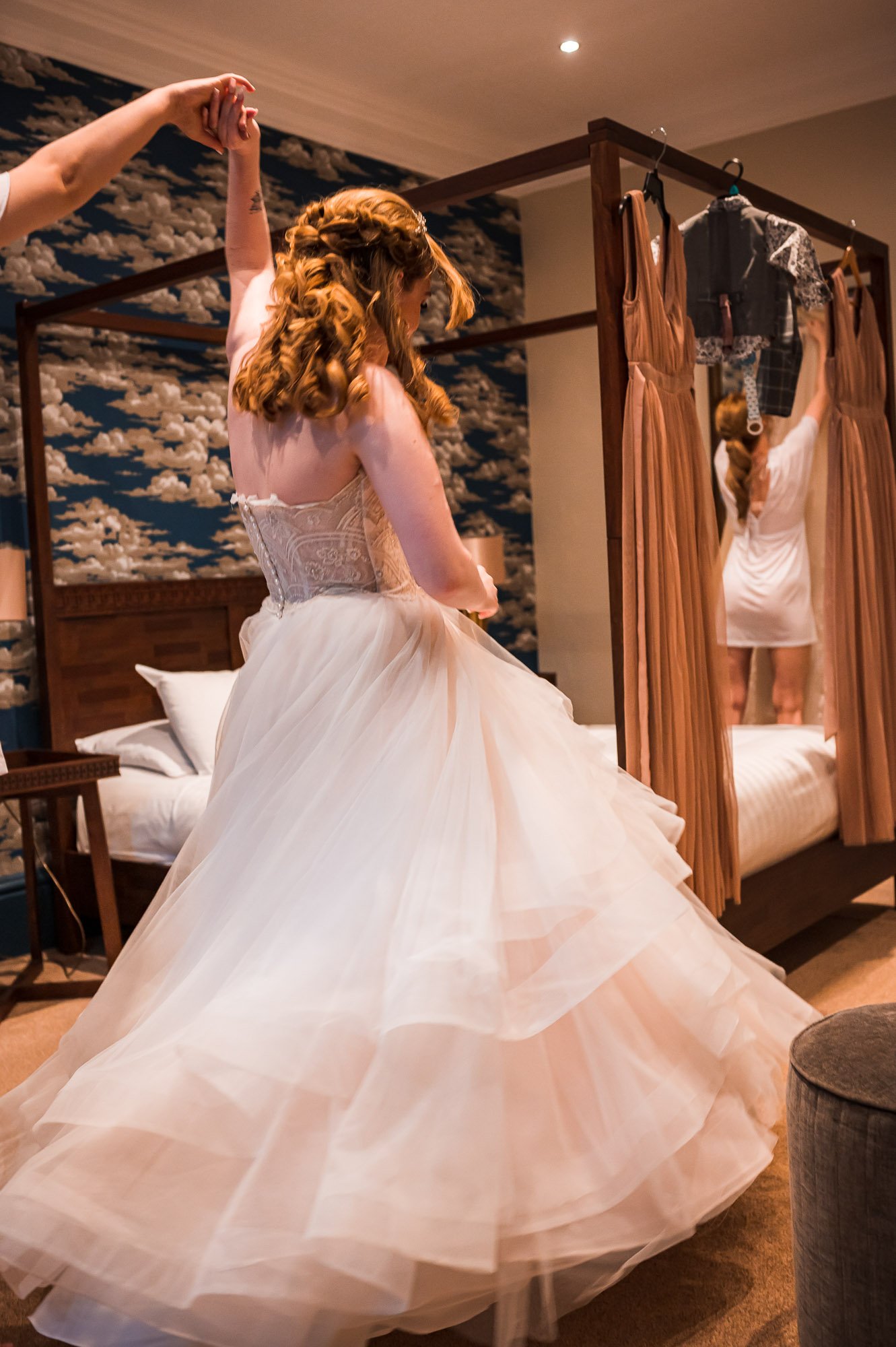Bride doing a twirl in her wedding dress