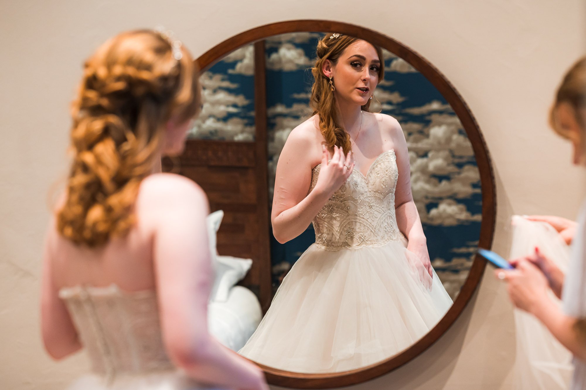 Bride checking herself out in the mirror