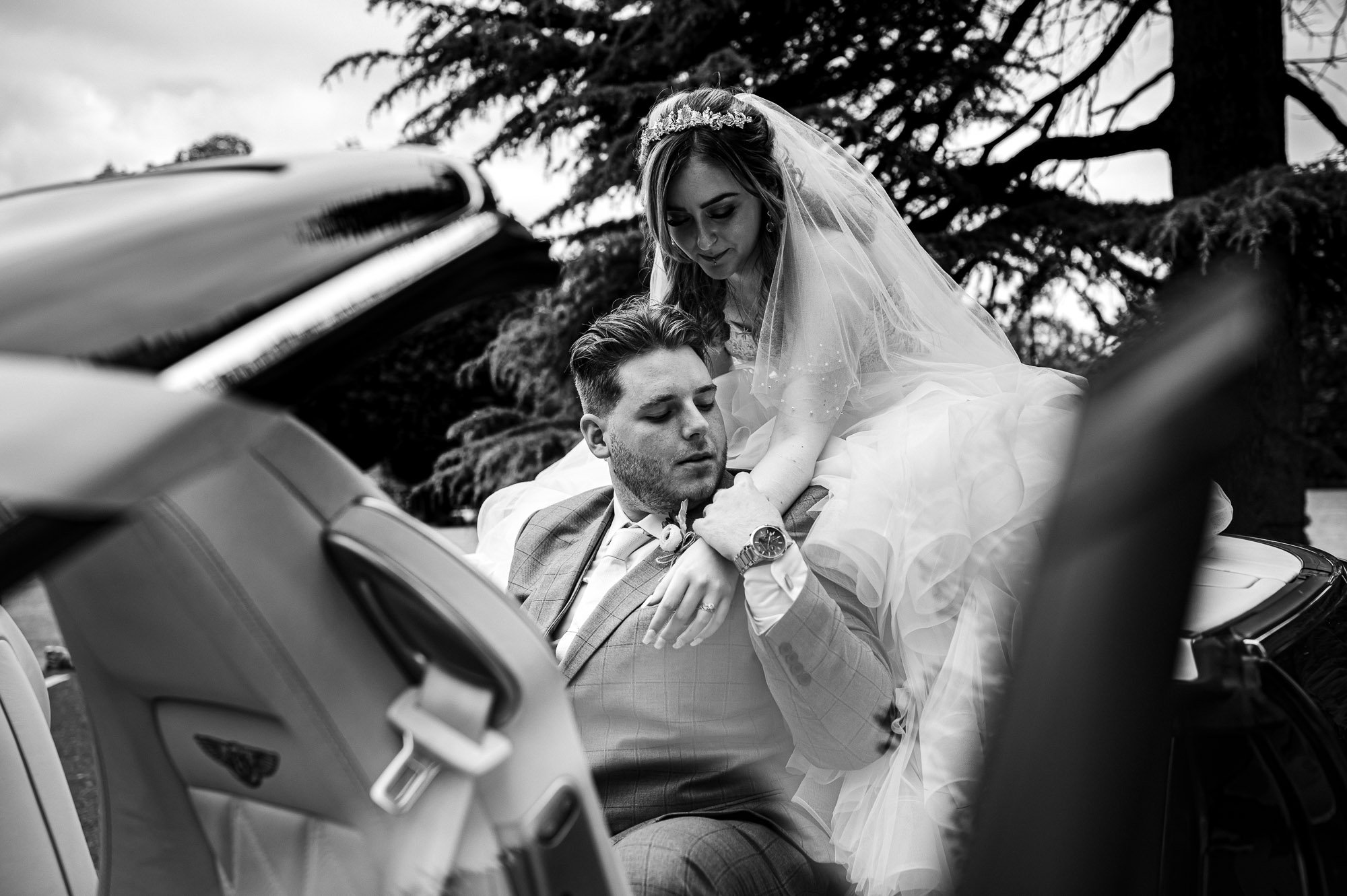 Bride and groom in the bridal car