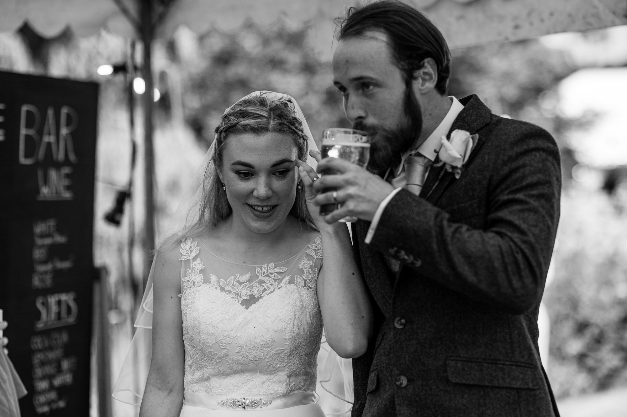 Bride and groom having a drink